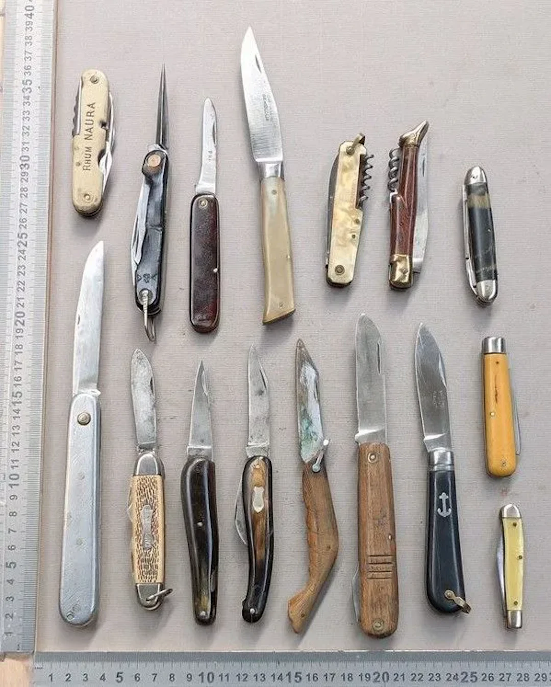 Set of 12 different vintage pocket knives, 1930–1950—see photos for