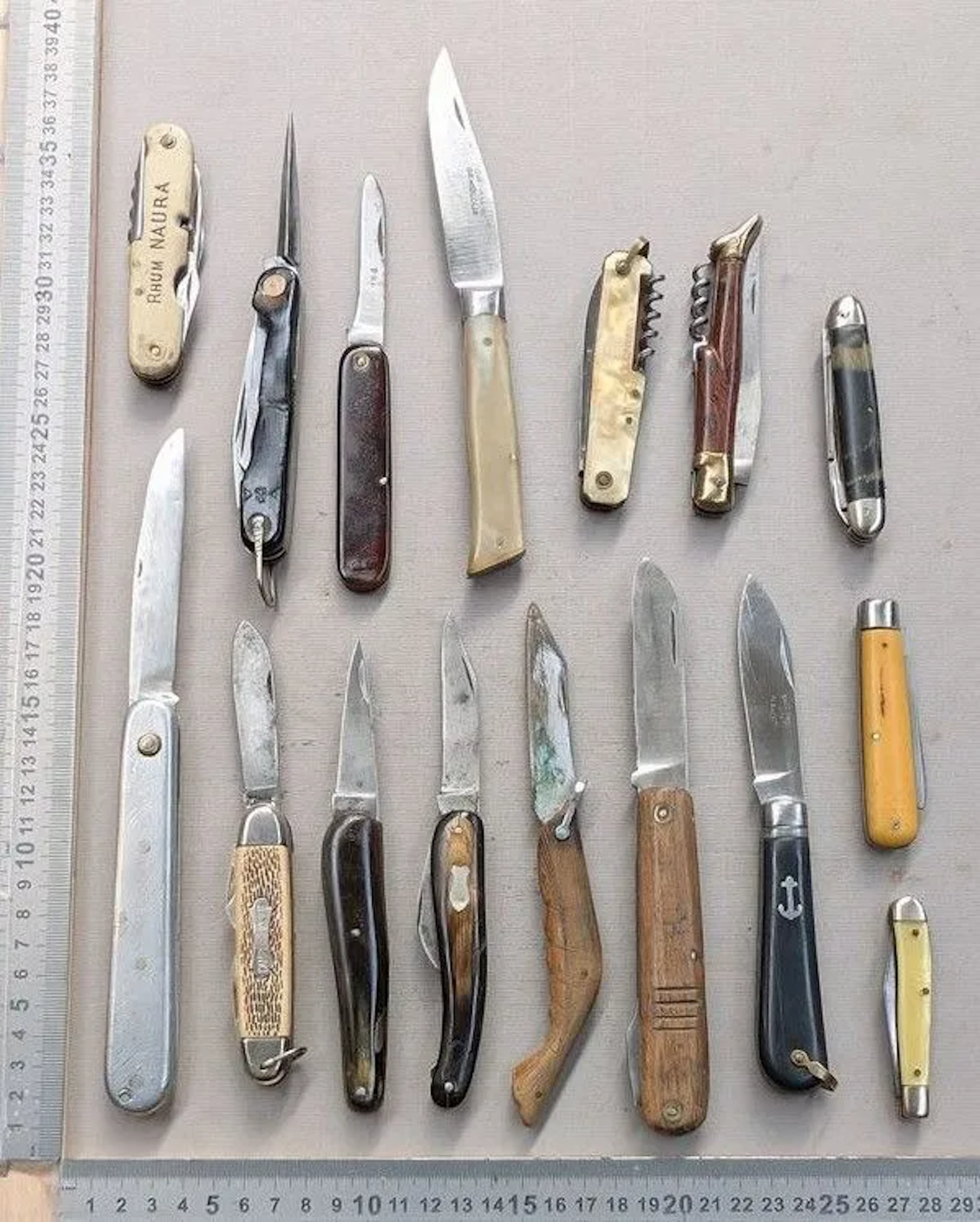 Set of 12 different vintage pocket knives, 1930–1950—see photos for