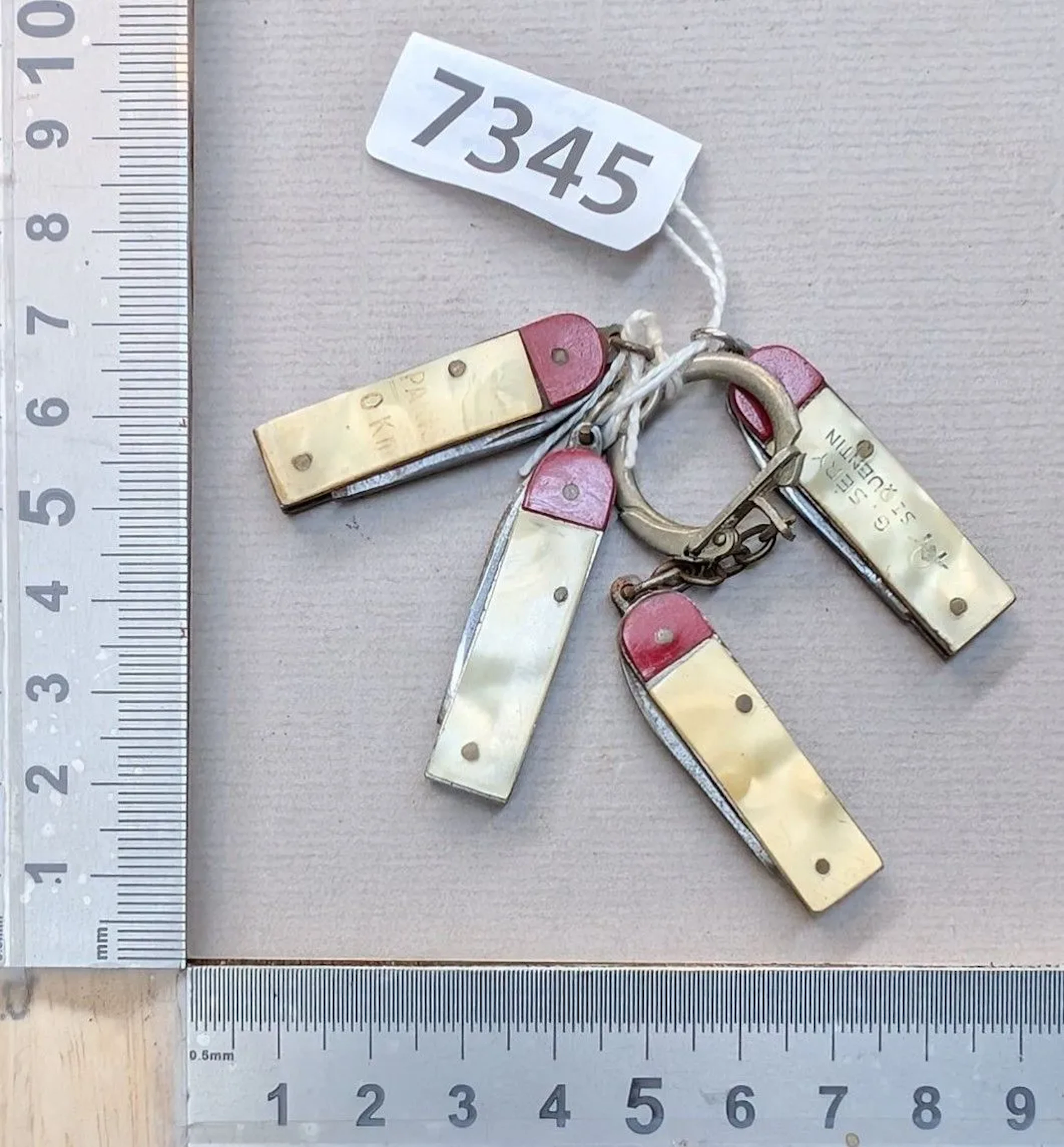 4 mini promotional knives—see photos for dimensions and condition