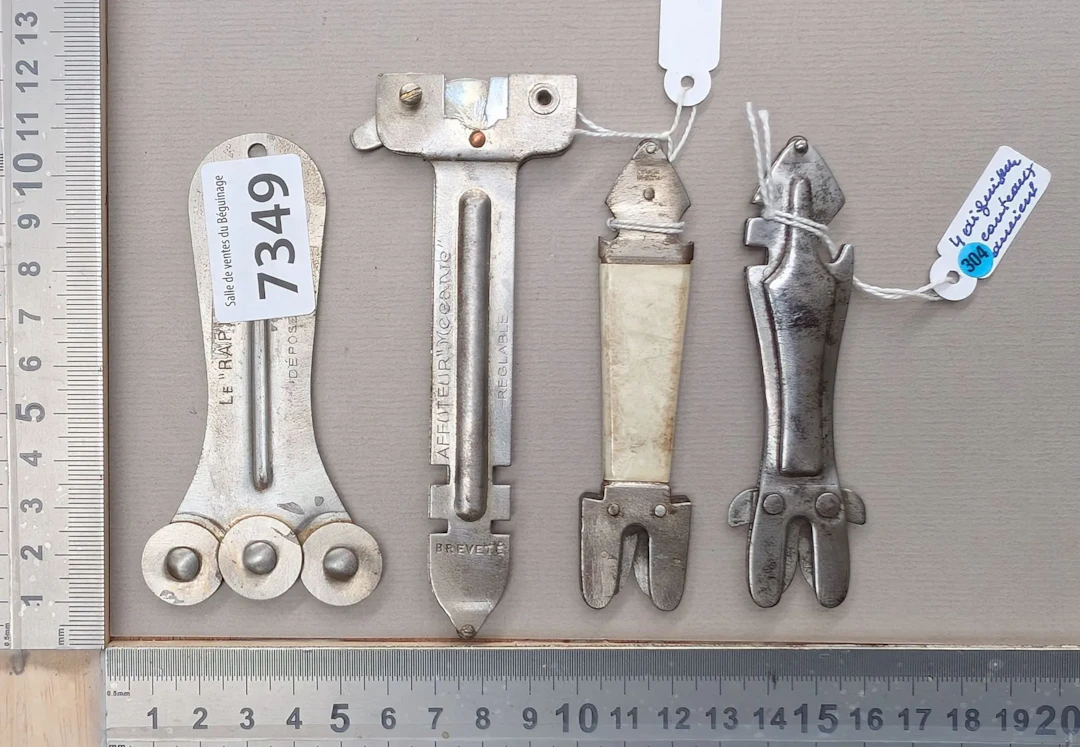 4 antique knife sharpeners—see photos for dimensions and condition