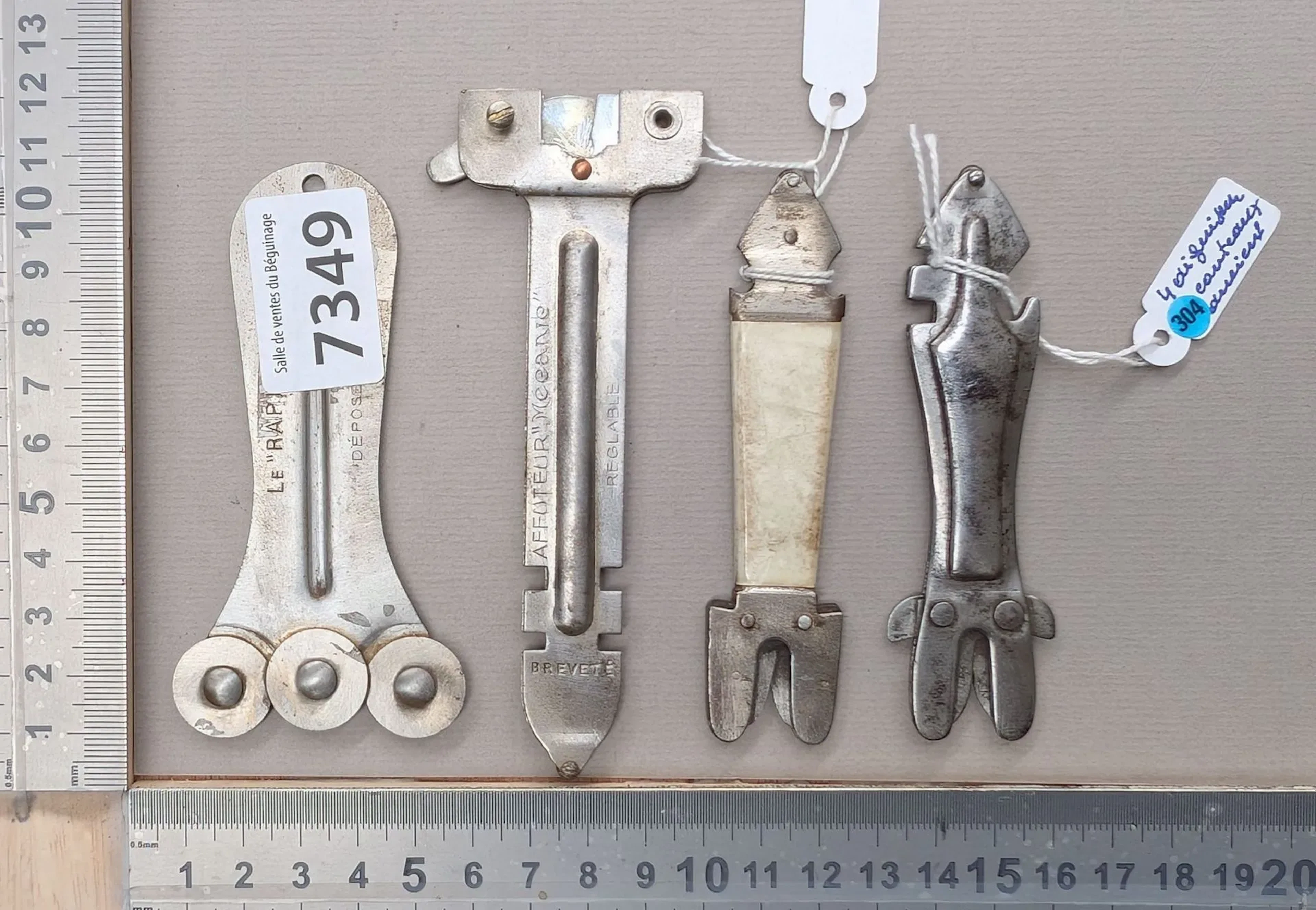 4 antique knife sharpeners—see photos for dimensions and condition