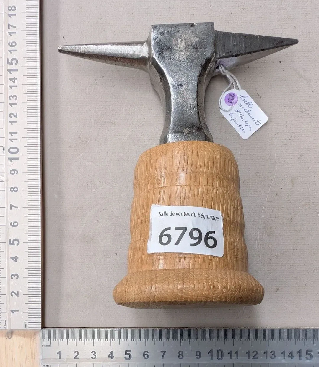 1 beautiful anvil on an oak base—see photos for dimensions and condition