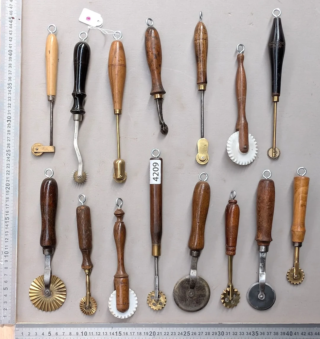 15 shoemaker's and saddler's tools on an oak base—see photos for dimensions