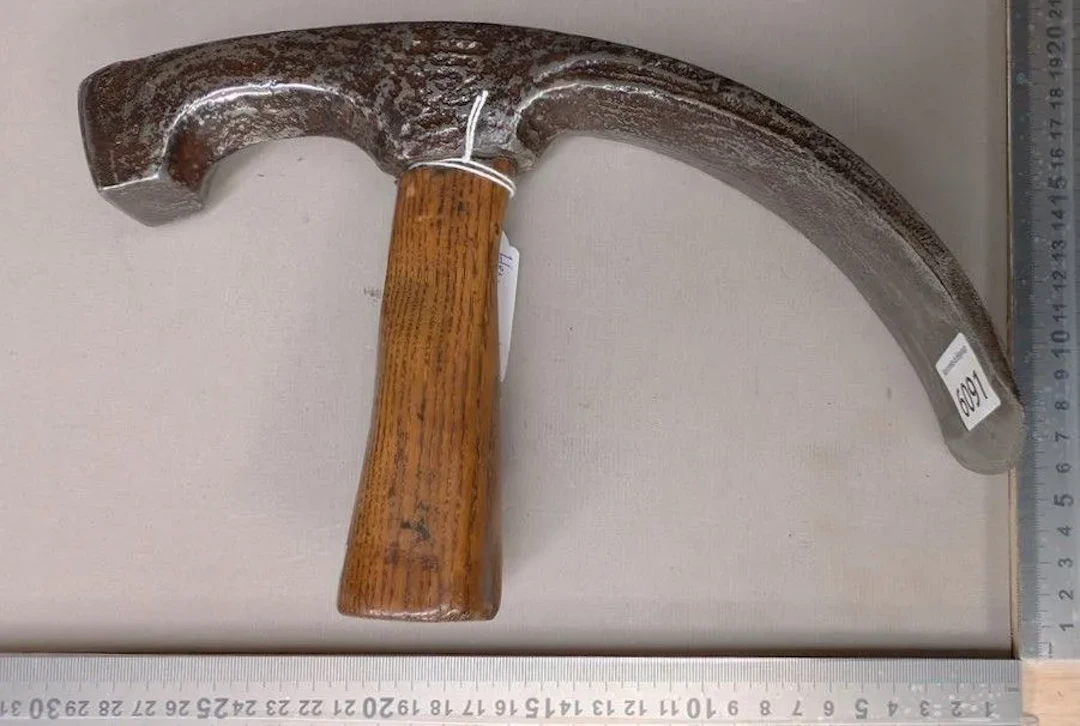 A forged steel adze—see photos for dimensions and condition