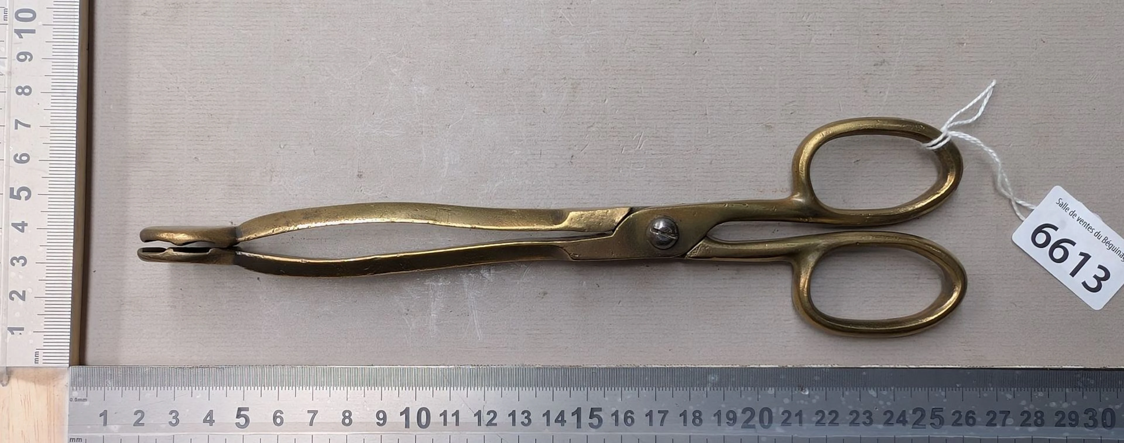 1 bronze fire tongs - See photos for dimensions and condition