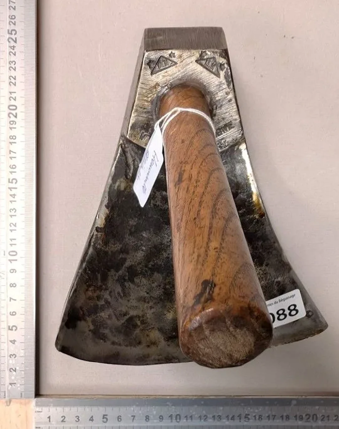 A forged steel adze—see photos for dimensions and condition