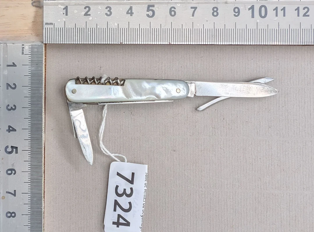 Vintage 5-in-1 knife—see photos for dimensions and condition