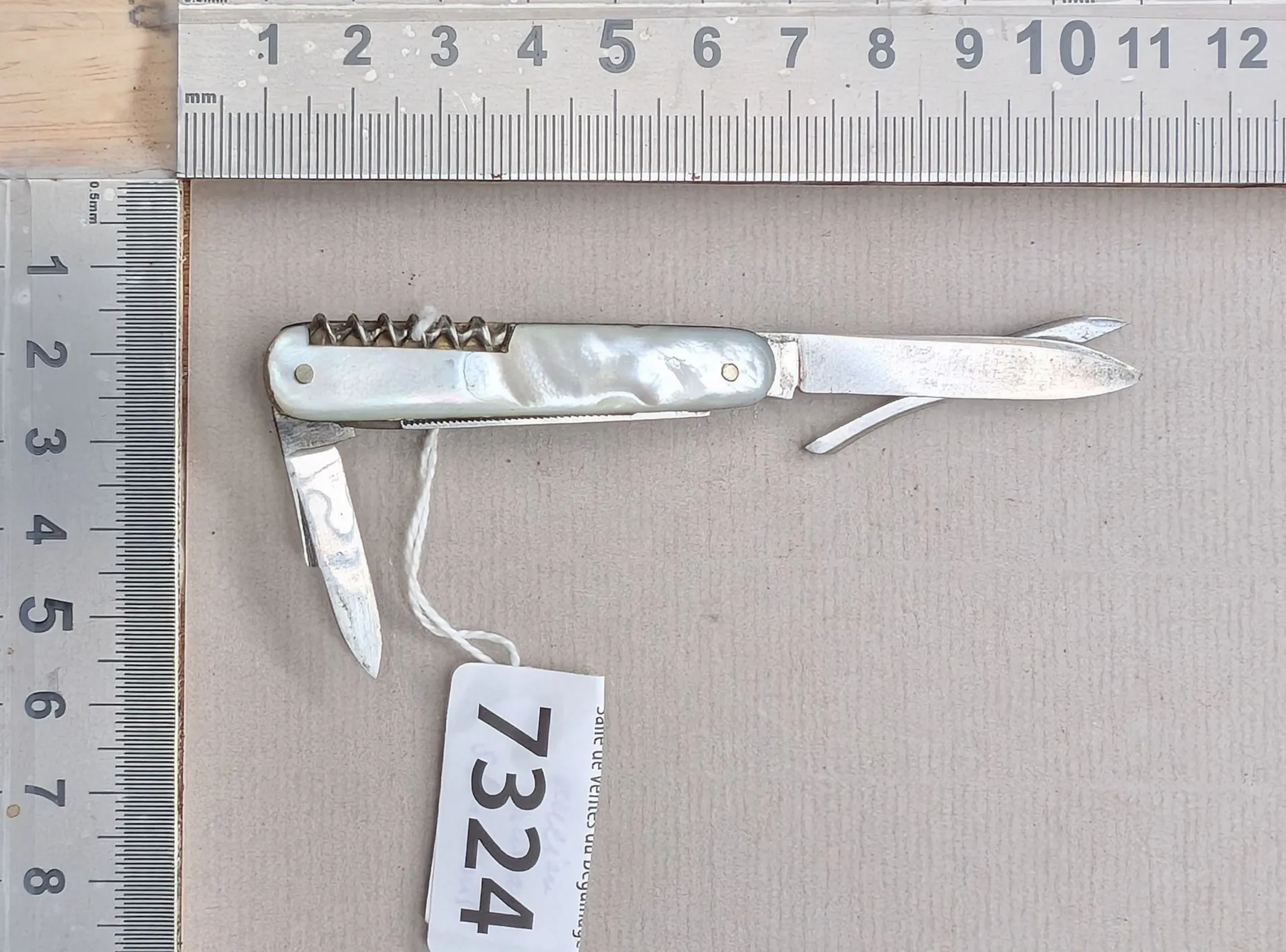 Vintage 5-in-1 knife—see photos for dimensions and condition