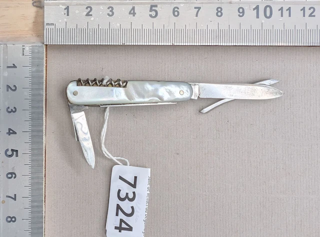 Vintage 5-in-1 knife—see photos for dimensions and condition