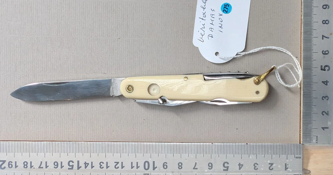1 genuine 7-function DAMAS INOX knife—see photos for dimensions and condition