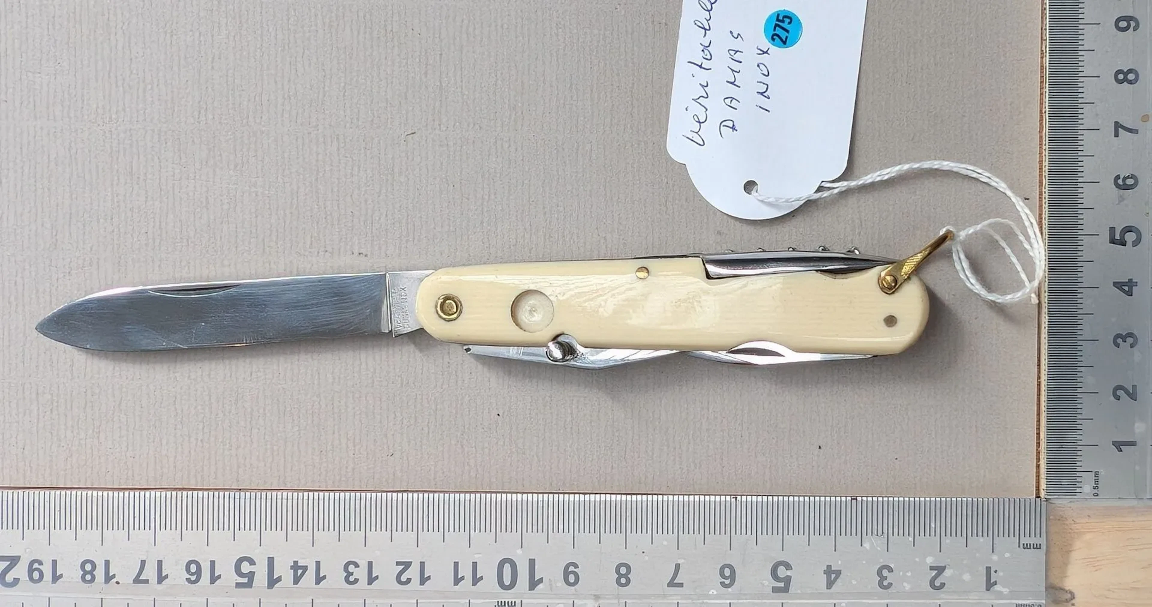 1 genuine 7-function DAMAS INOX knife—see photos for dimensions and condition