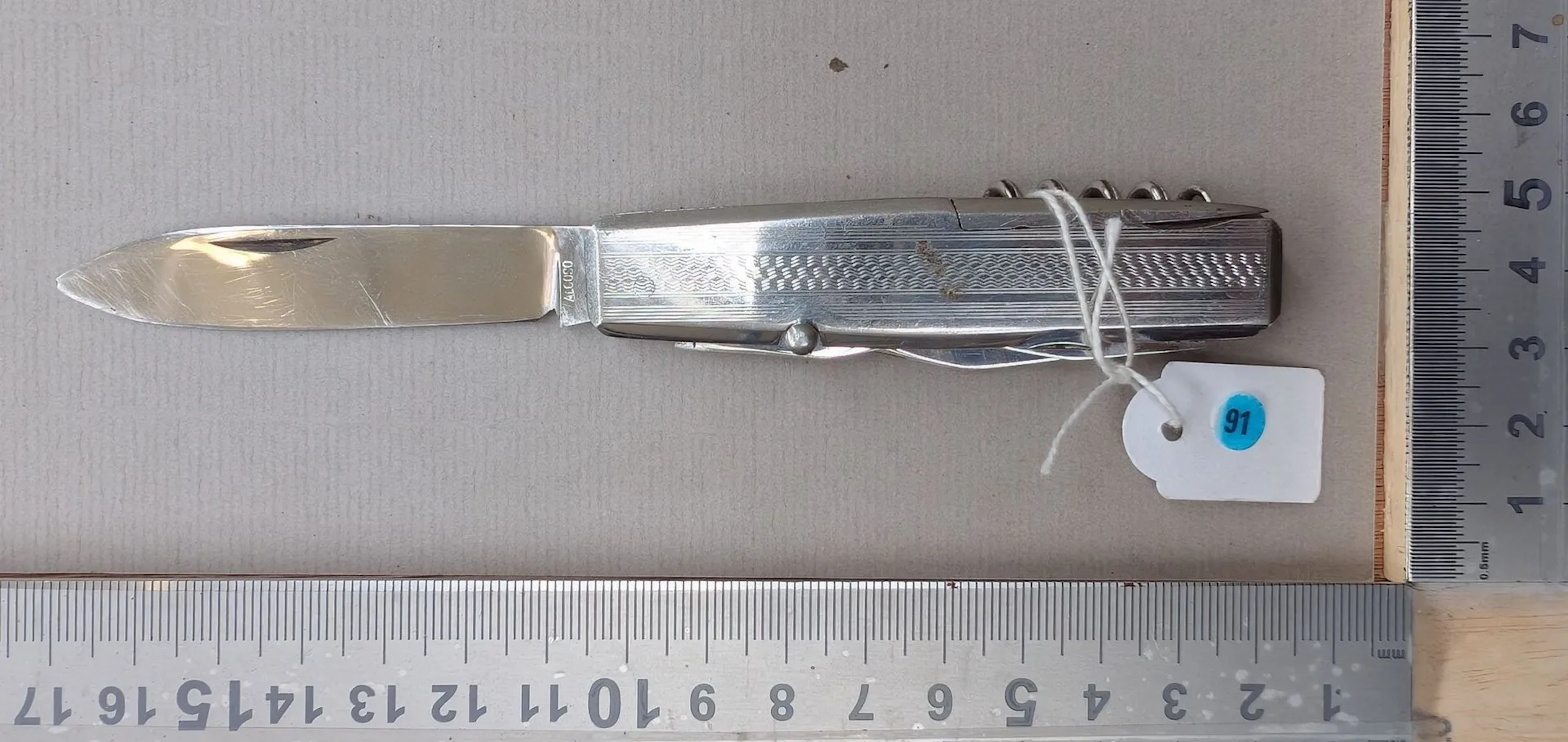 Vintage ROSTFREI metal multi-tool pocket knife—see photos for dimensions