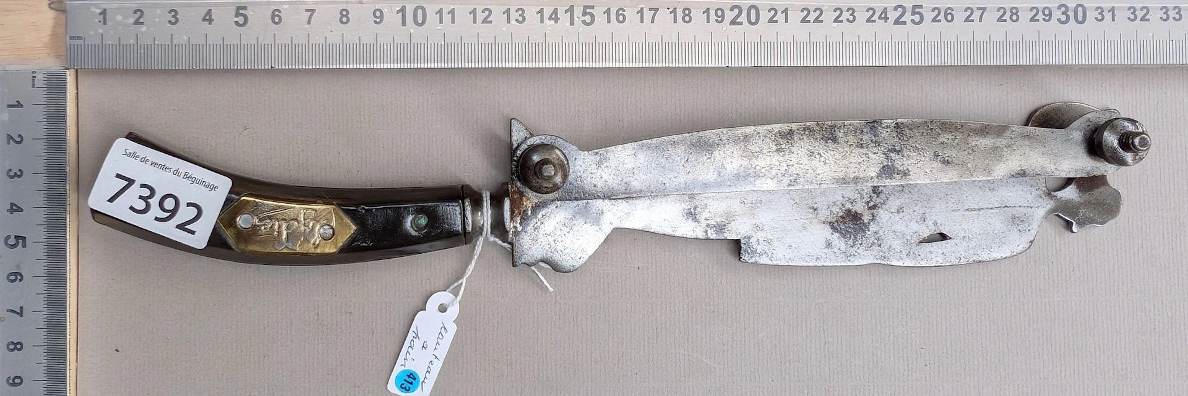 1 beautiful antique bread knife with a steel blade—see photos for