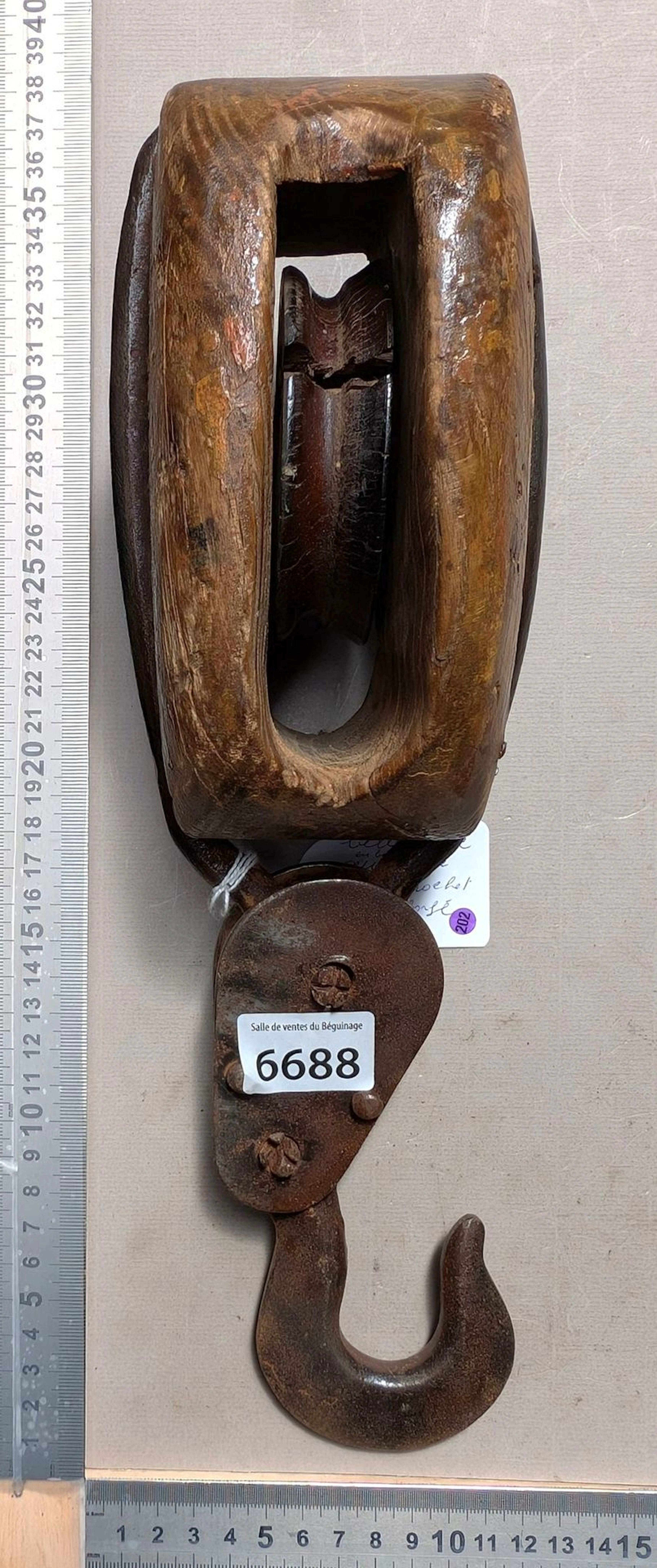 Beautiful antique wooden pulley with a wrought-iron hook—see photos