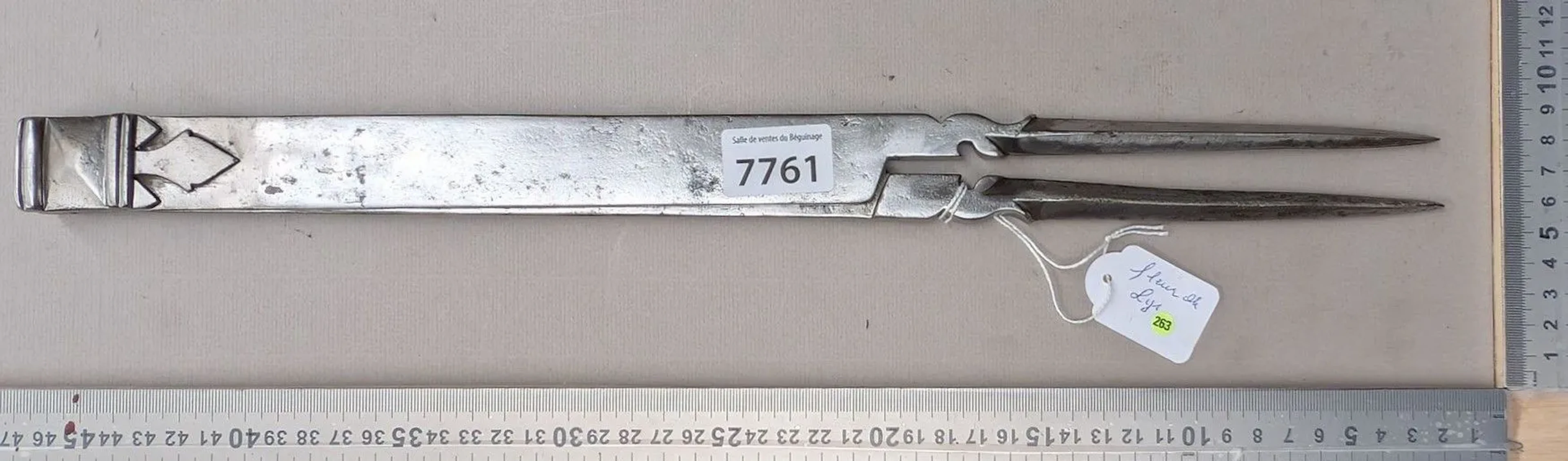 Antique 18th-century wrought-iron compass with fleur-de-lis on both