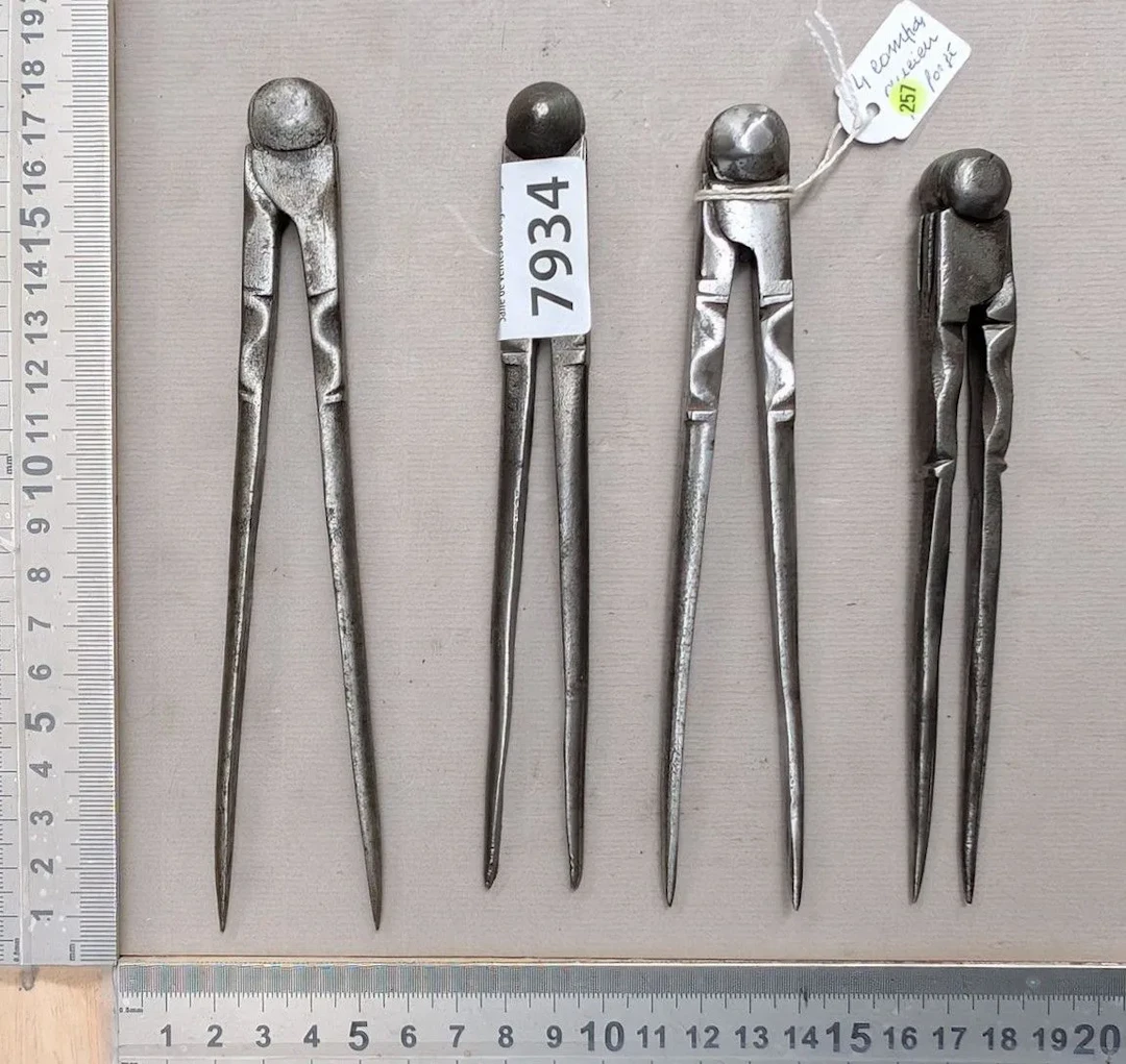 1 set of 4 different wrought-iron compasses—see photos for dimensions