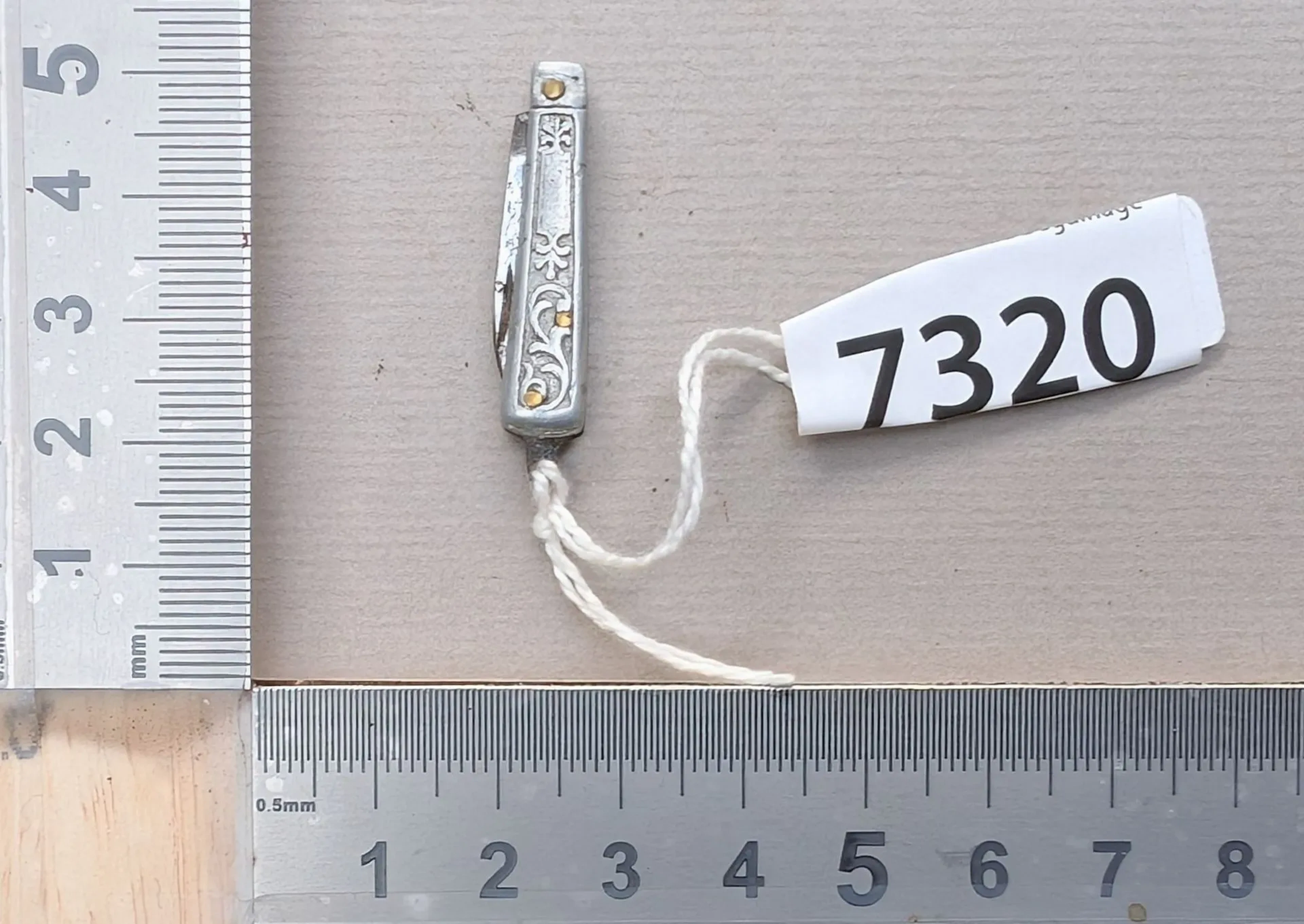 Antique mini knife—see photos for dimensions and condition
