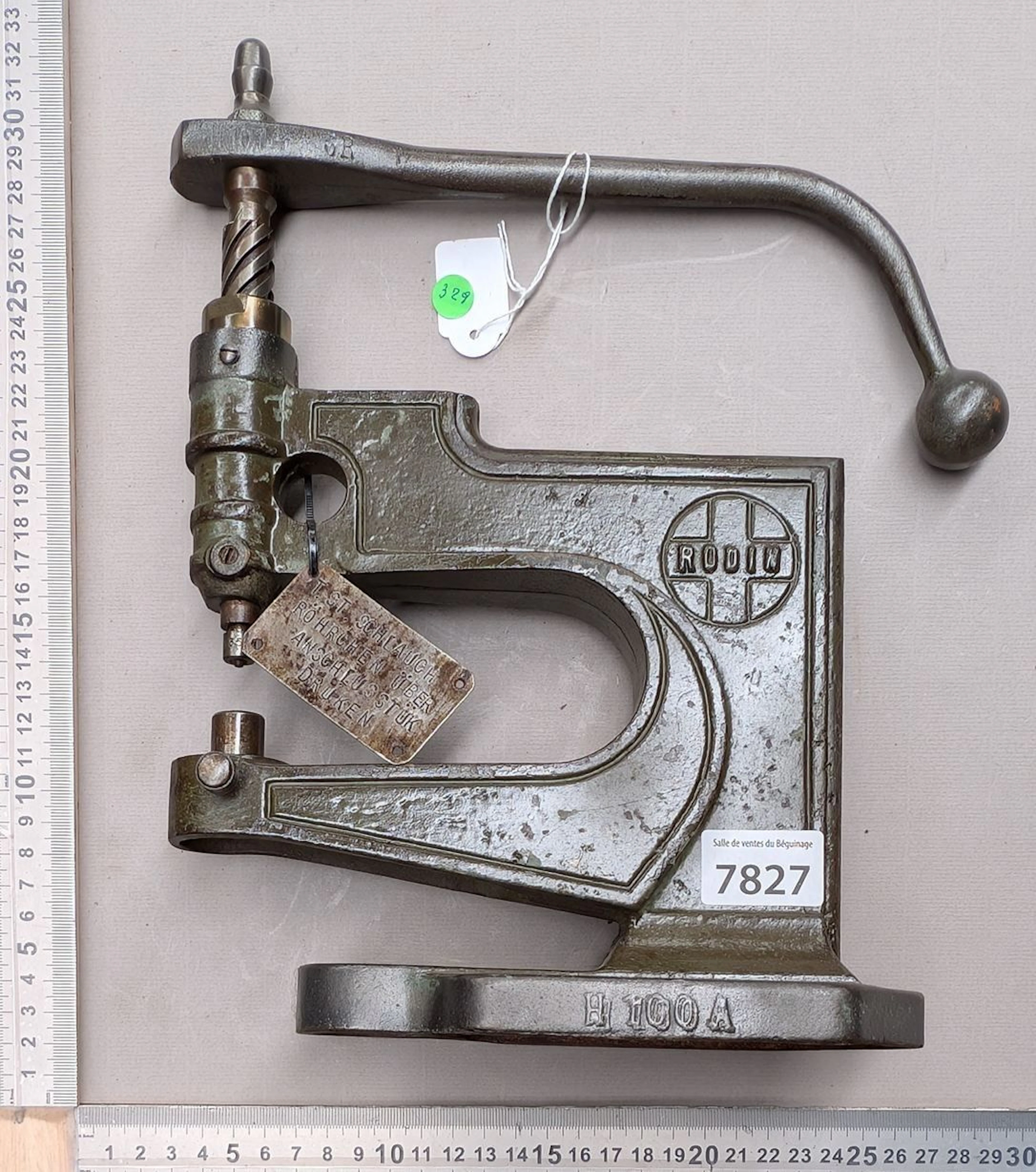 1 antique eyelet press—see photos for dimensions and condition
