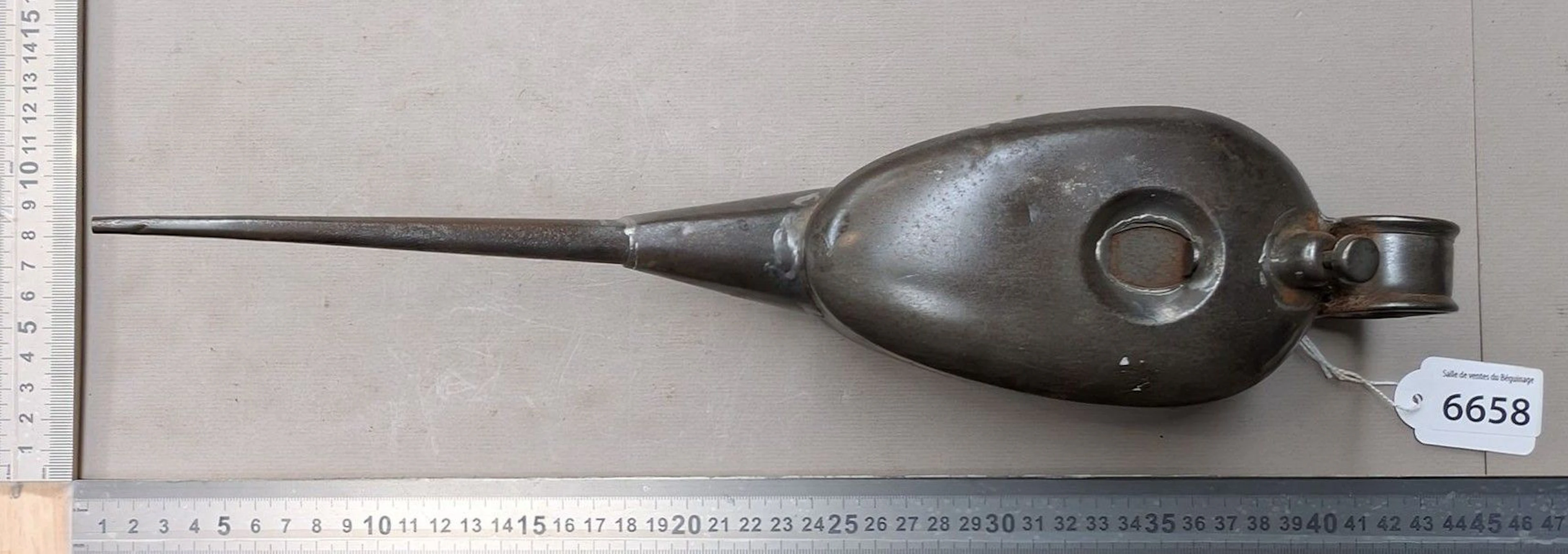 1 tin pitcher with a spout—see photos for dimensions and condition