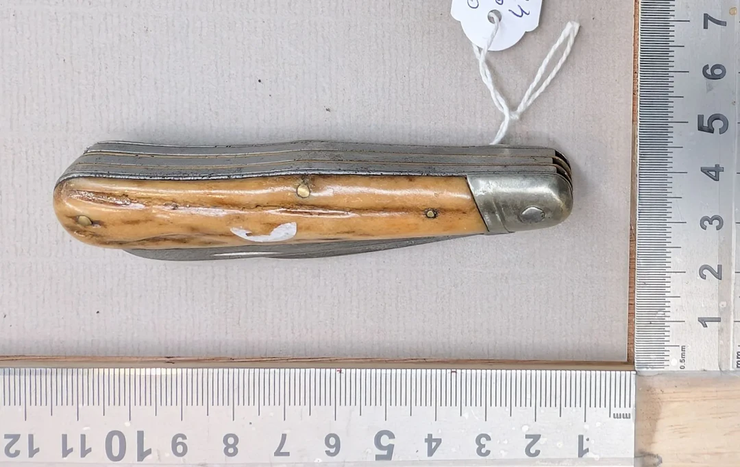 Antique 4-blade knife—see photos for dimensions and condition