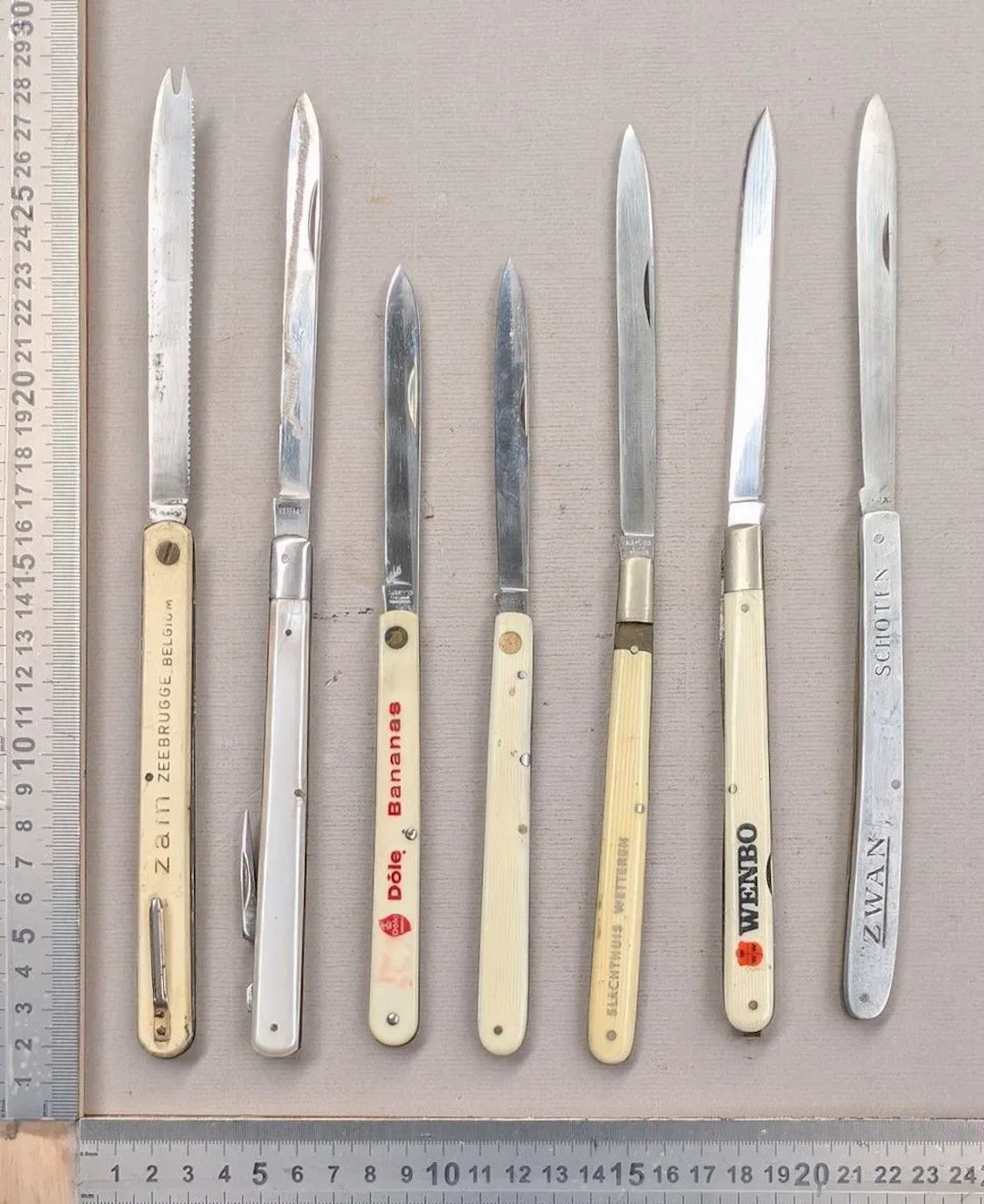 Set of 7 different vintage pocket knives, 1930–1970—see photos for