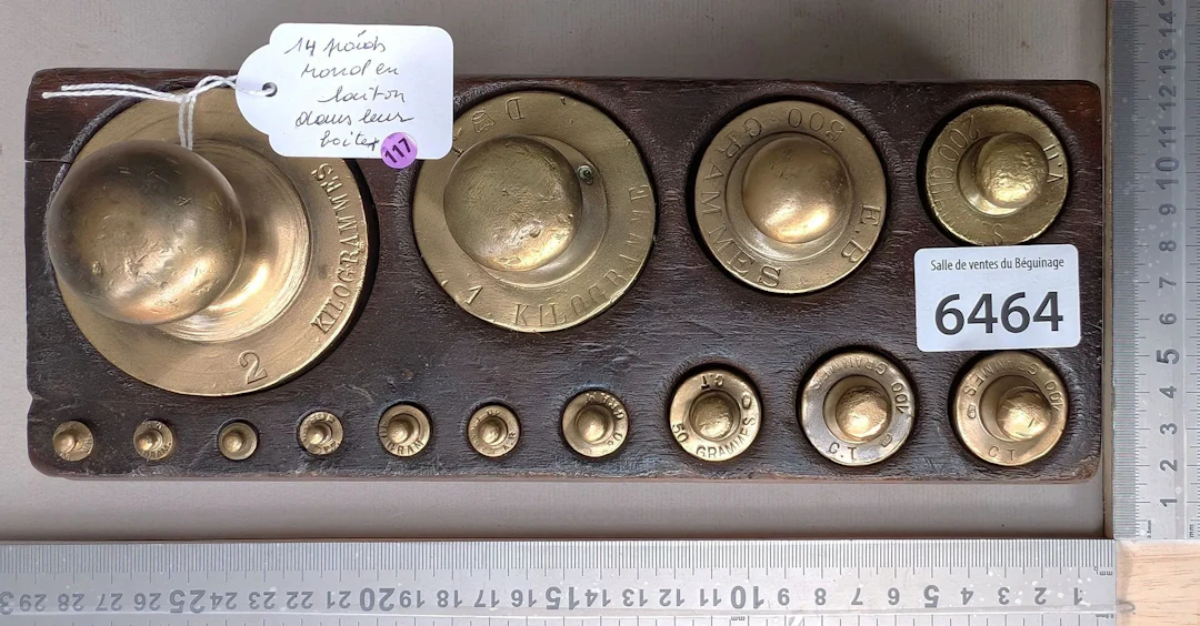 Set of 14 bronze weights in their case—see photos for dimensions and condition