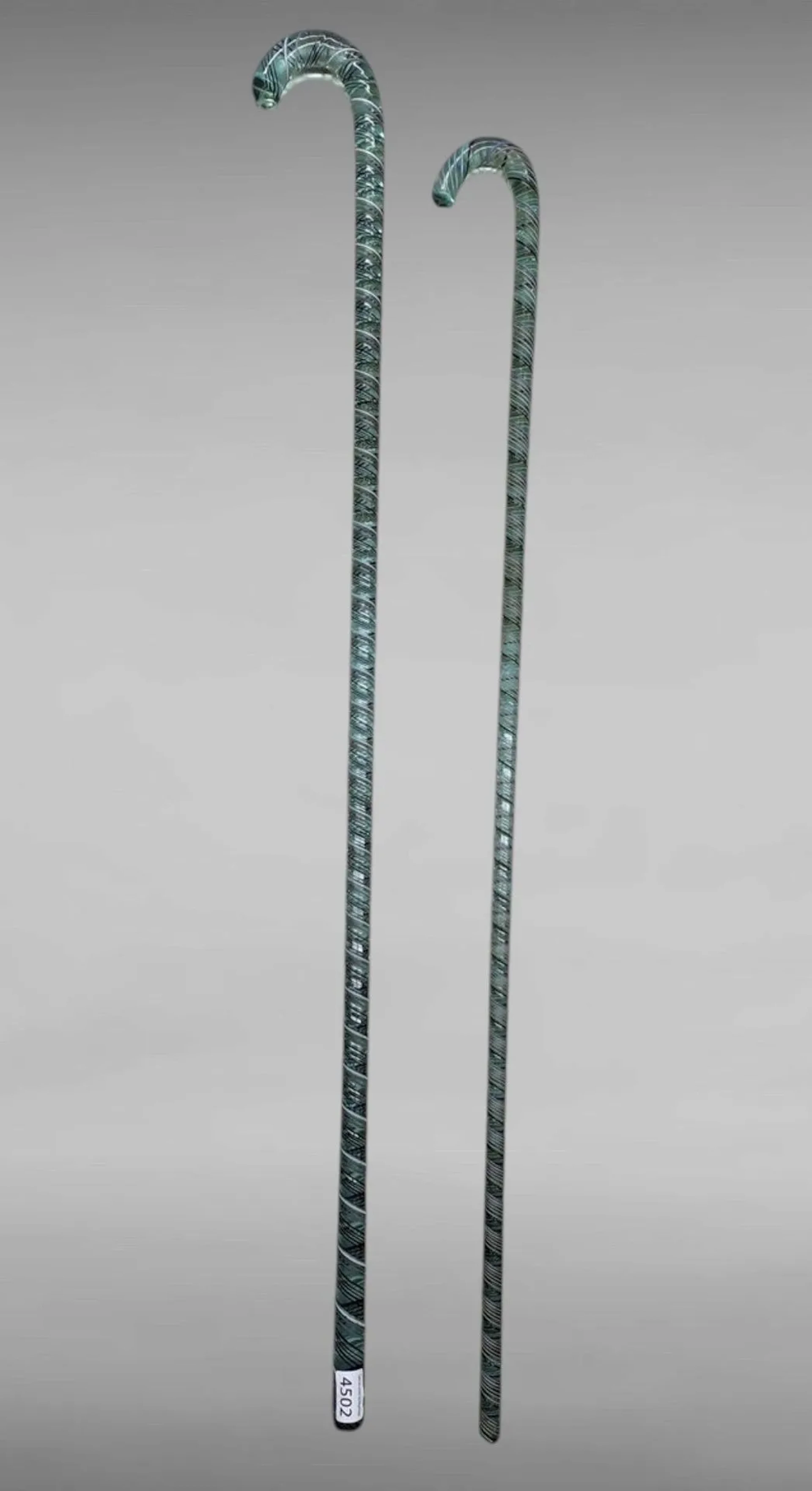 2 glass conscript canes—see photos for dimensions and condition