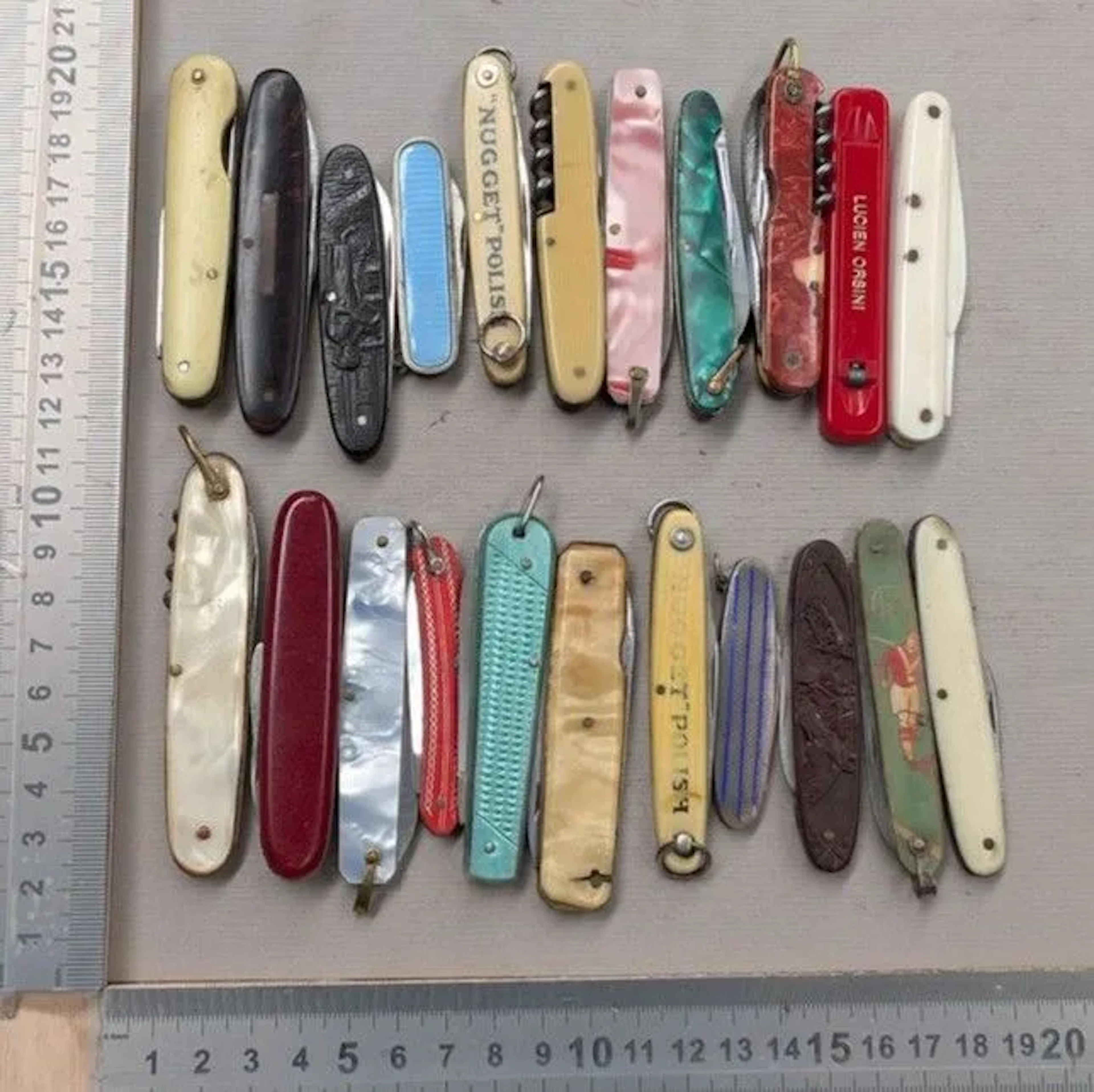 Set of 22 vintage promotional pocket knives from 1900—see photos for