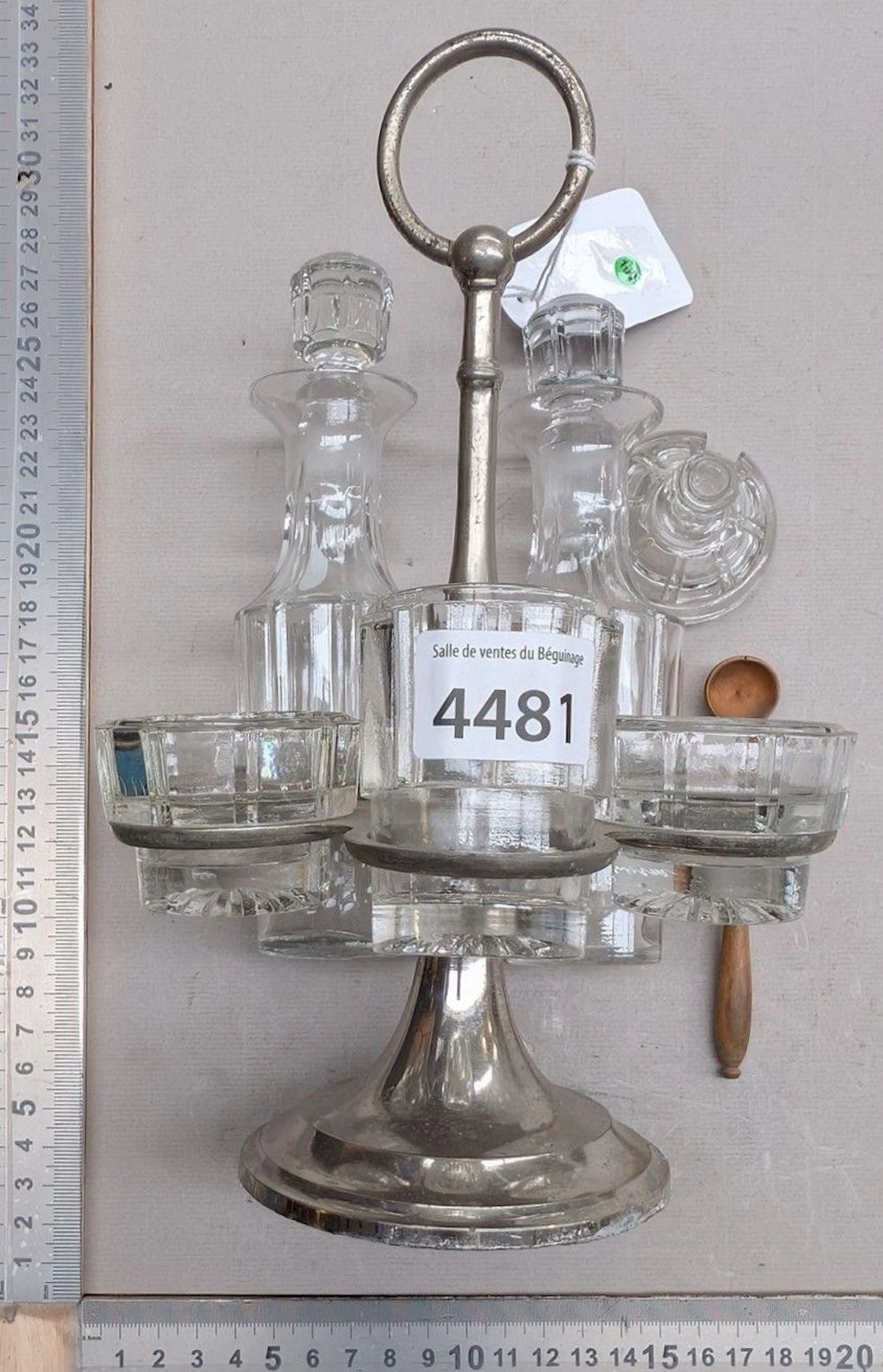 Table set for oil, vinegar, salt, pepper, and mustard—see photos for