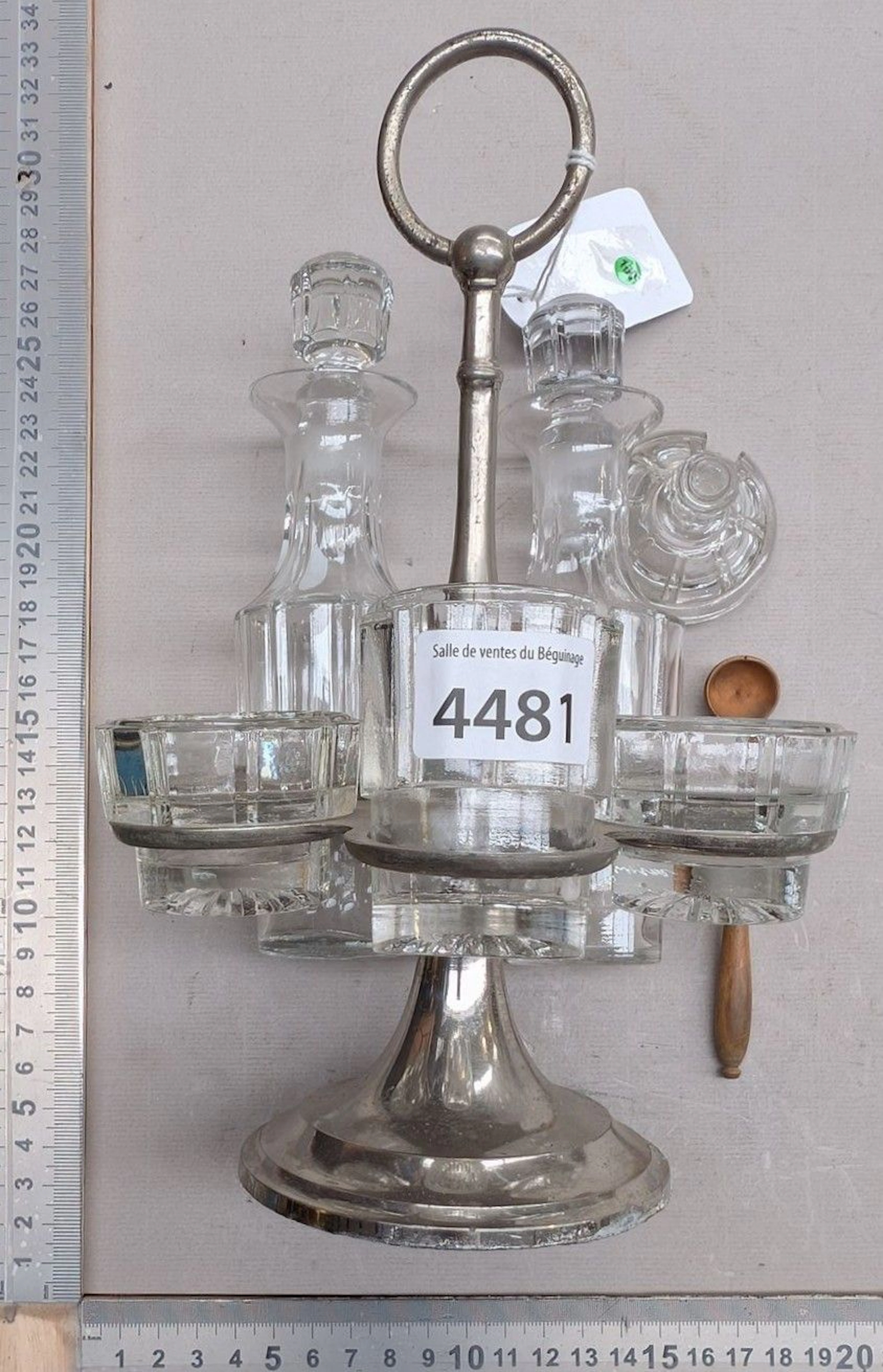 Table set for oil, vinegar, salt, pepper, and mustard—see photos for