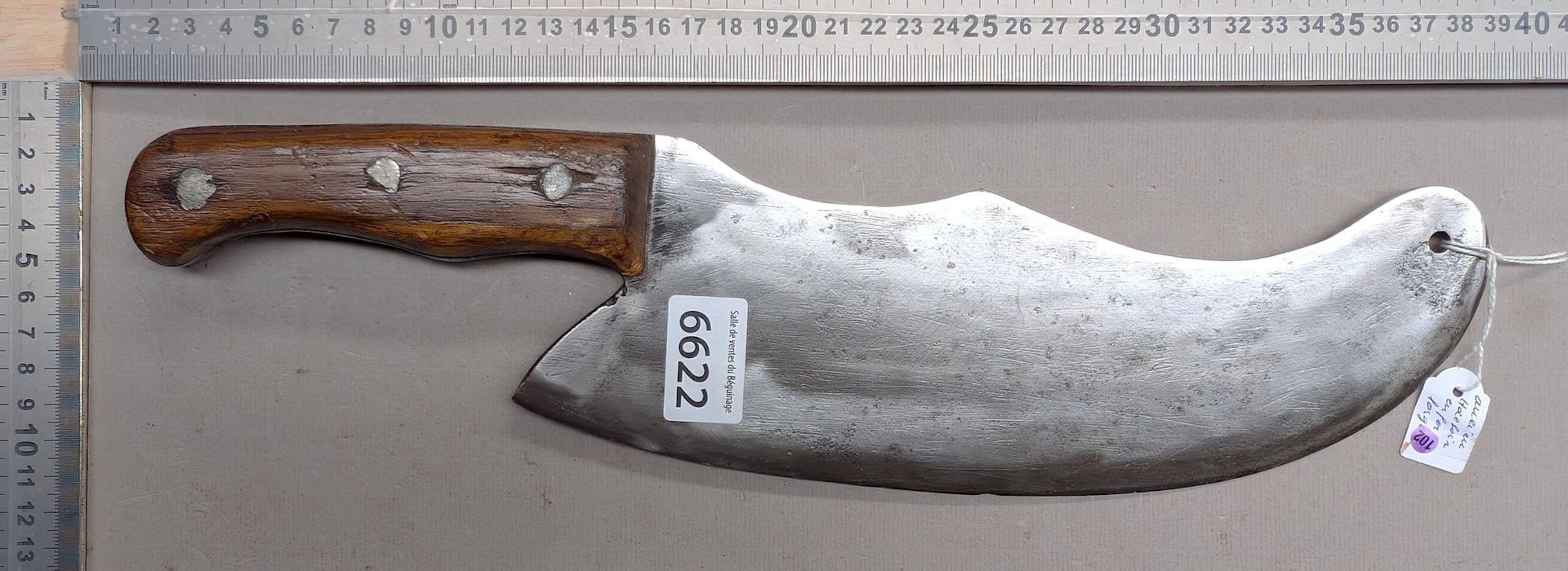 Antique cleaver with steel blade and wooden handle—see photos for