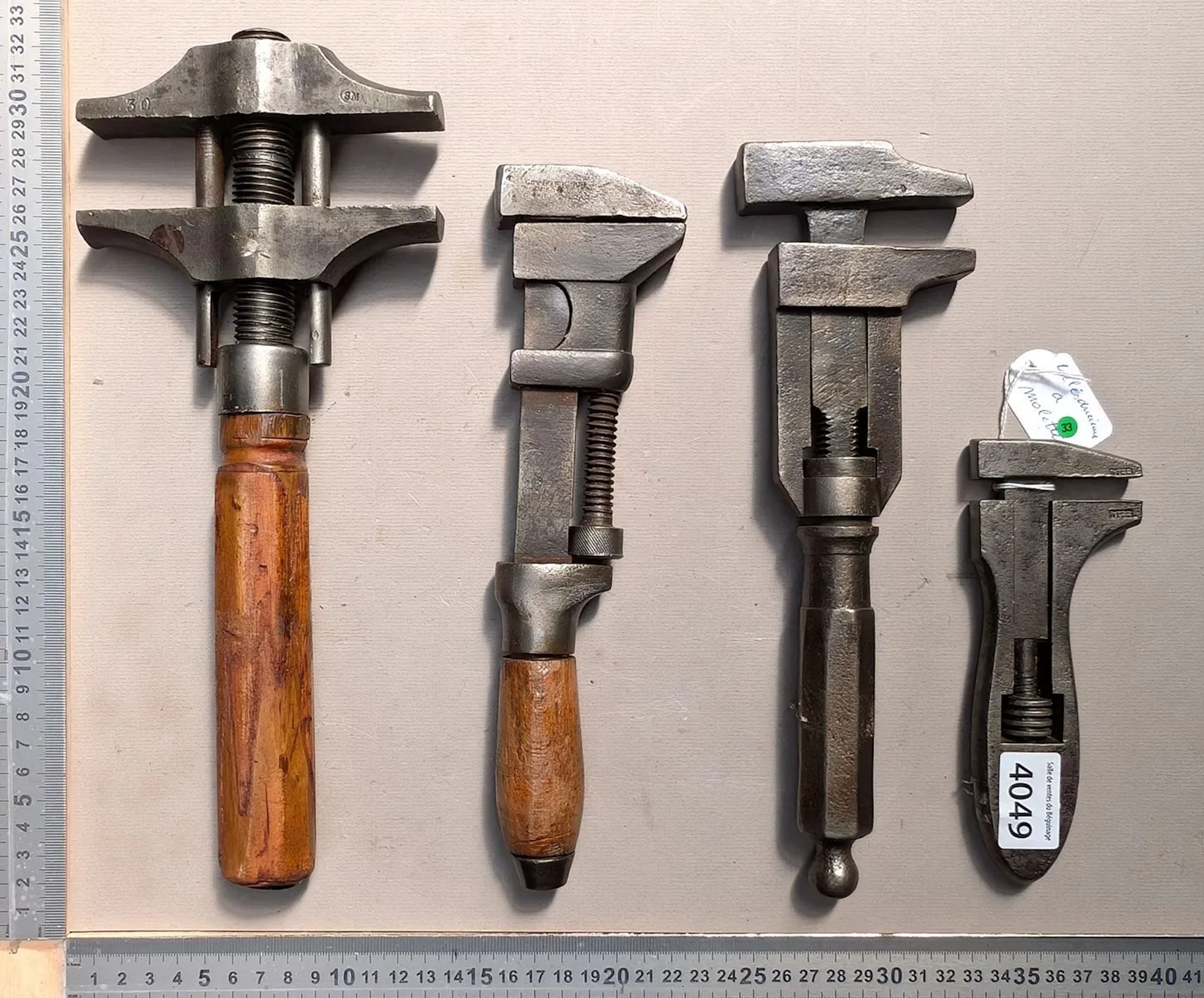 4 adjustable wrenches—see photos for dimensions and condition