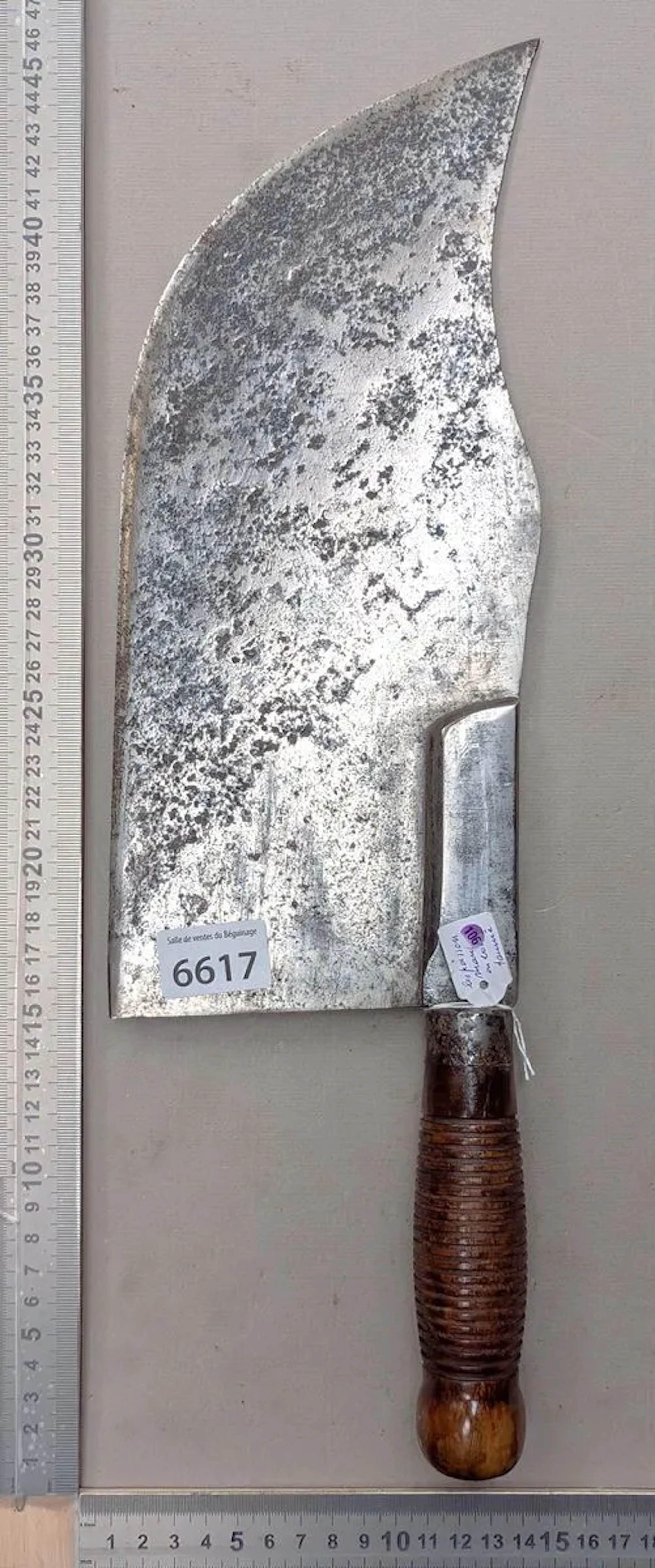 Antique cleaver with steel blade and wooden handle—see photos for