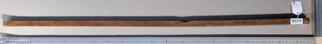 Antique wooden and brass measuring tape—see photos for dimensions and condition