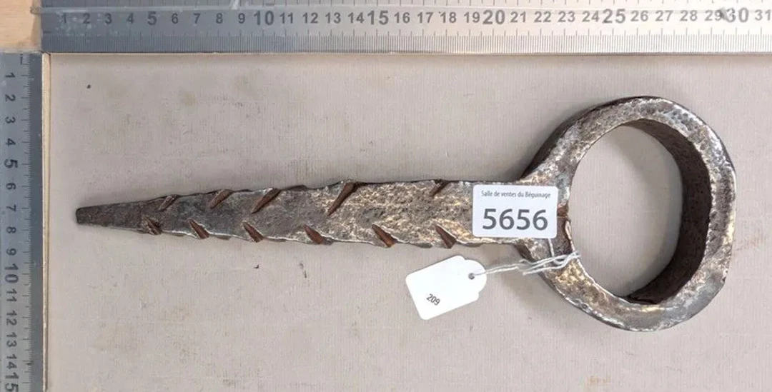 Antique wrought-iron door knocker—see photos for dimensions and condition