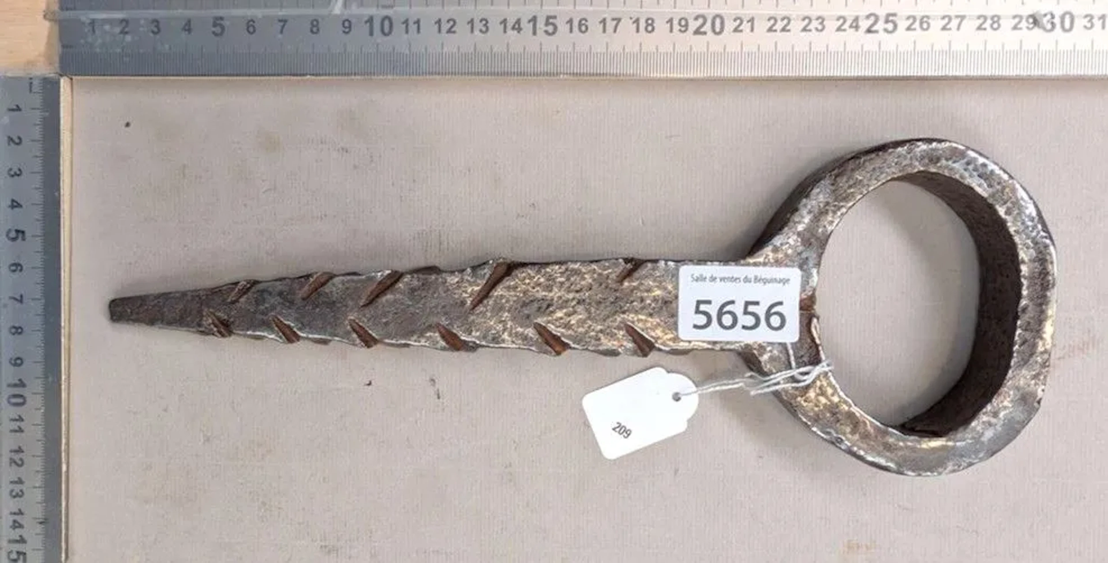 Antique wrought-iron door knocker—see photos for dimensions and condition