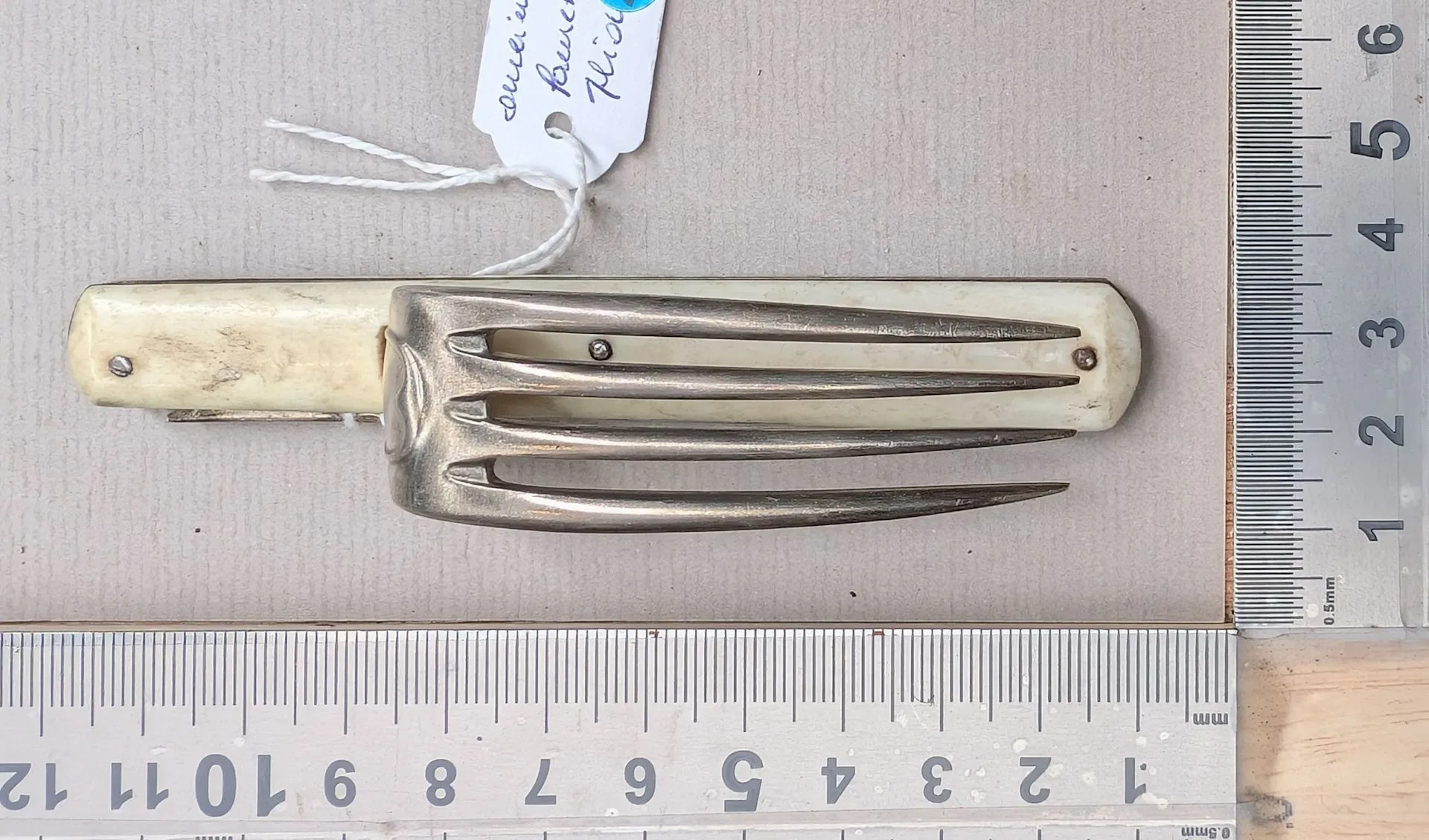 Antique folding fork—see photos for dimensions and condition