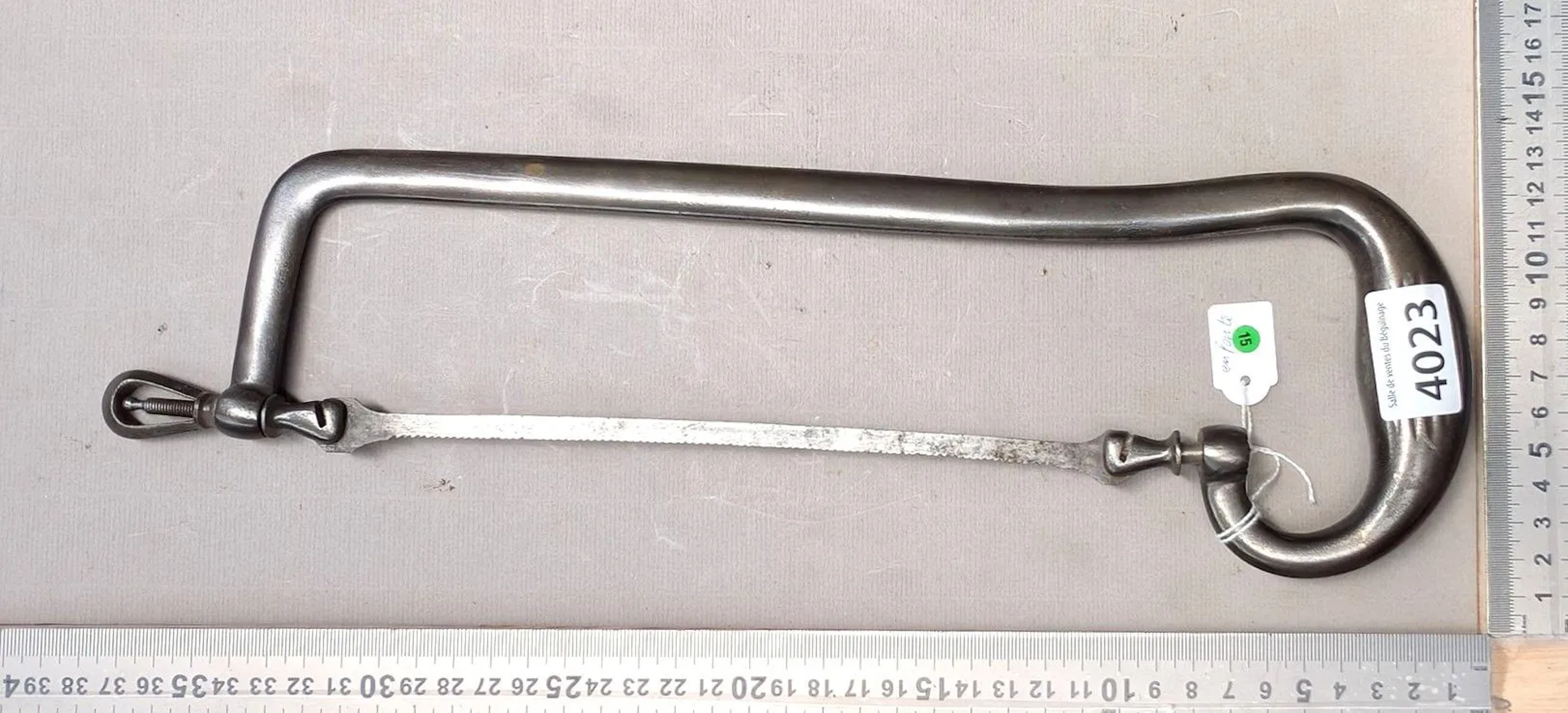 1 antique medical saw—see photos for dimensions and condition