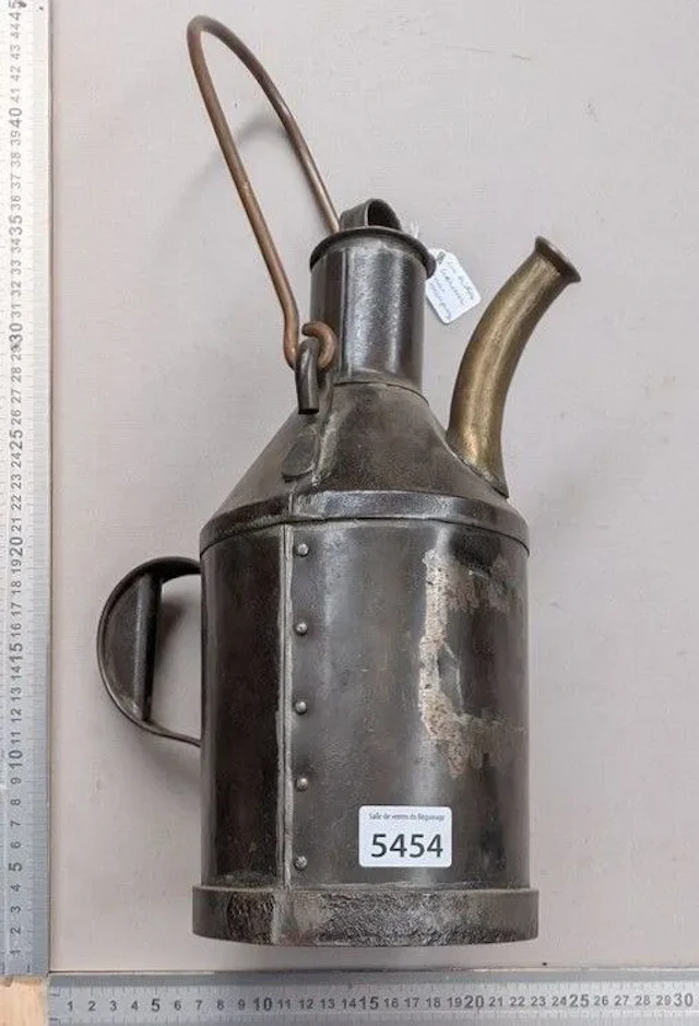 An unmarked pouring jug—see photos for dimensions and condition