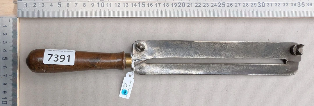 1 antique bread knife with a wooden handle—see photos for dimensions