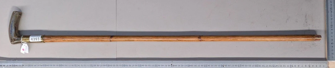 A horse dealer's stick repurposed as a measuring rod, showing signs