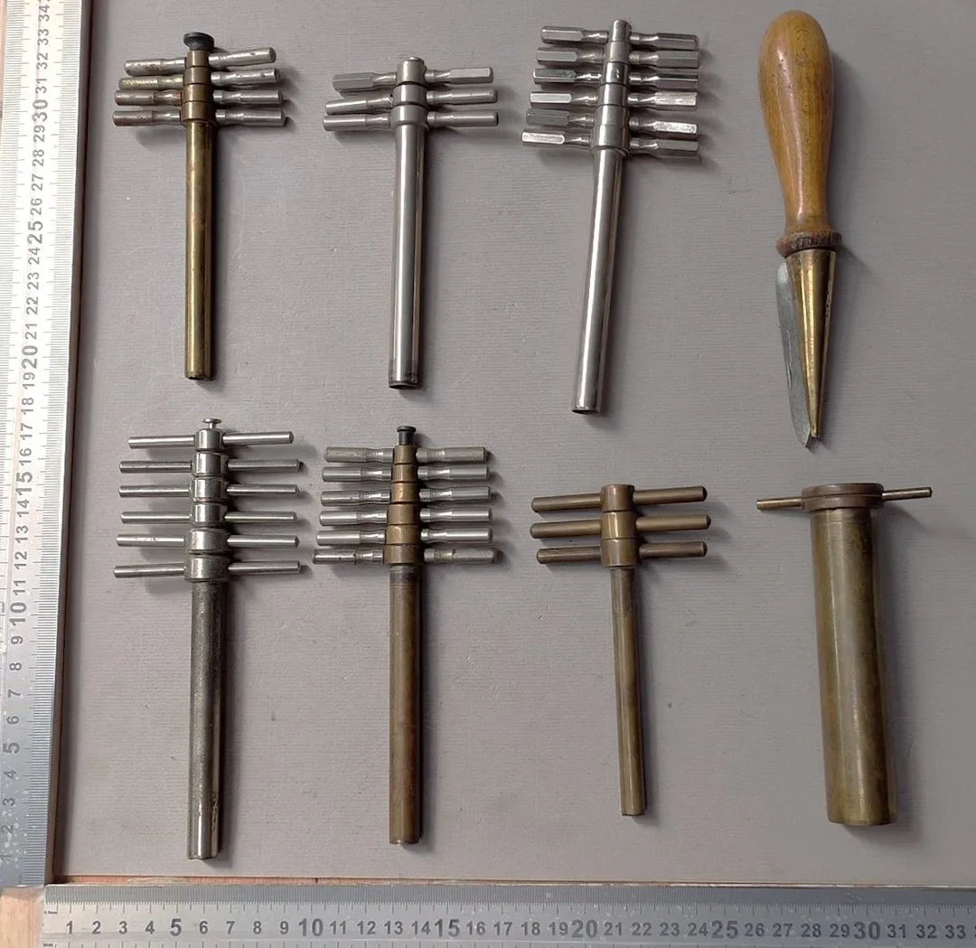 1 set of bronze corkscrews + 1 sharpener (from a pharmacy) — See photos