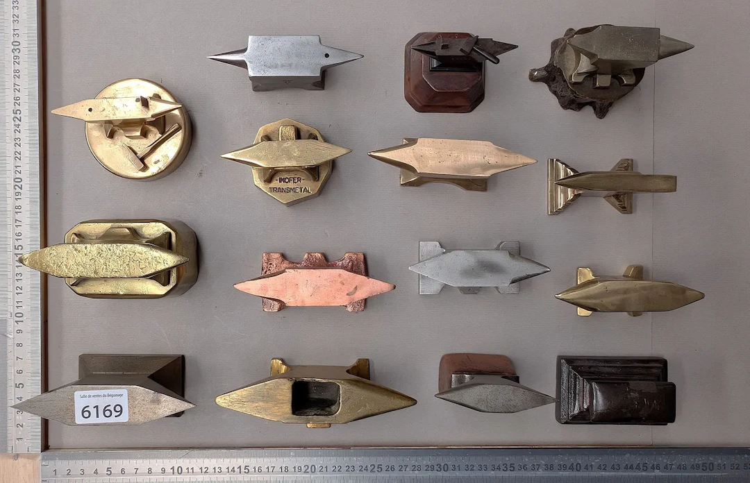 Set of 15 small anvils—see photos for dimensions and condition