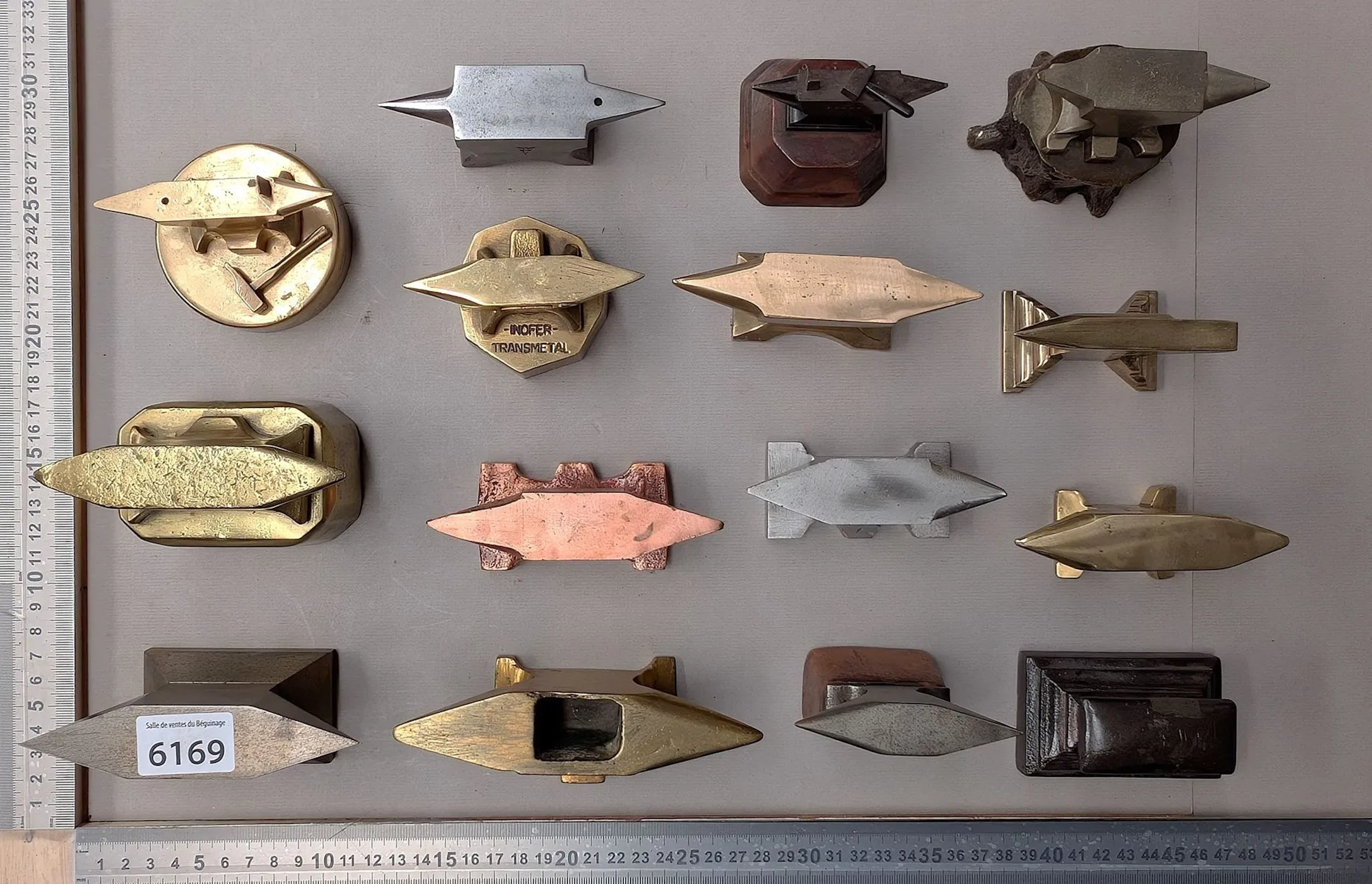 Set of 15 small anvils—see photos for dimensions and condition