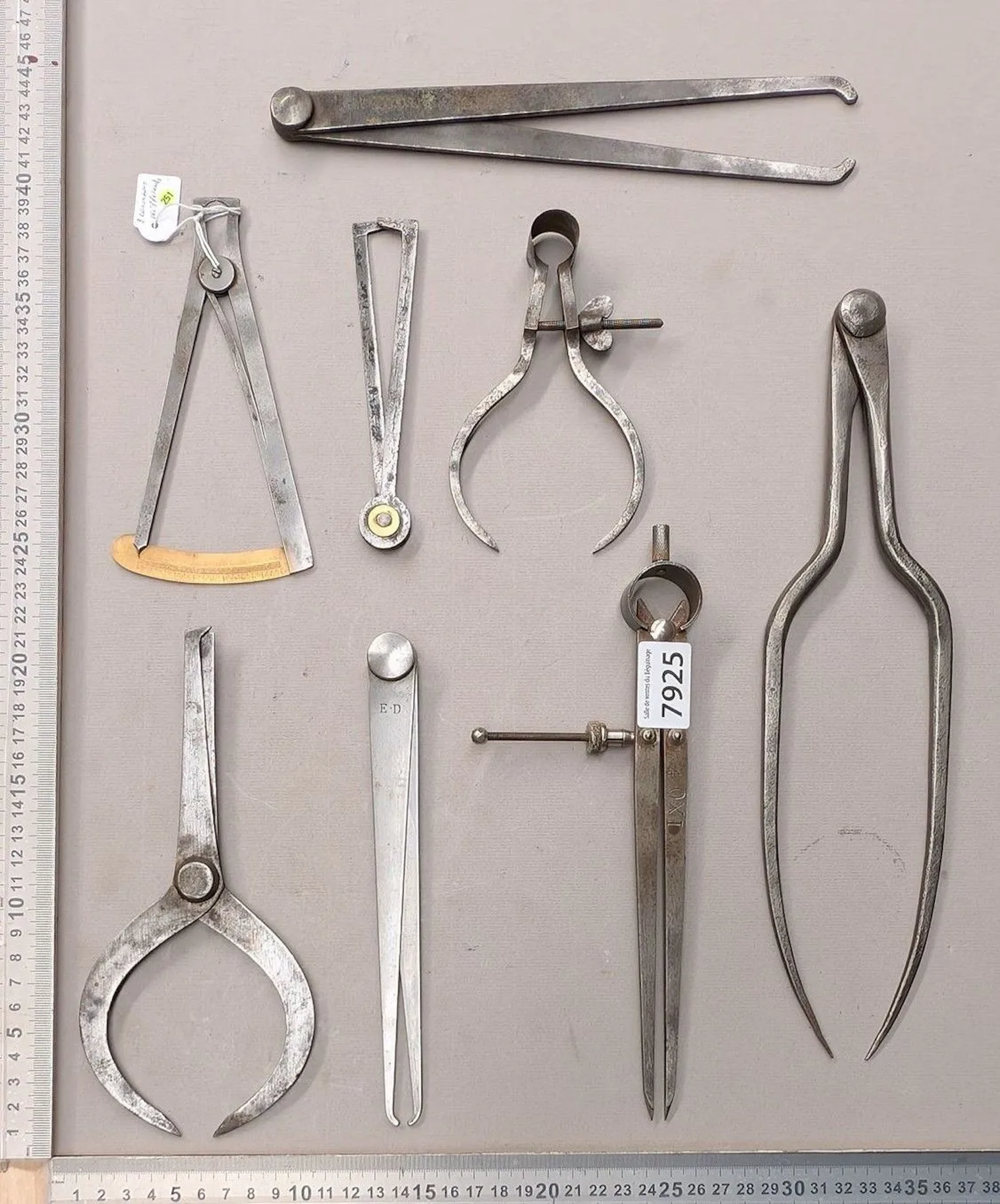 1 set of 8 different compasses—see photos for dimensions and condition