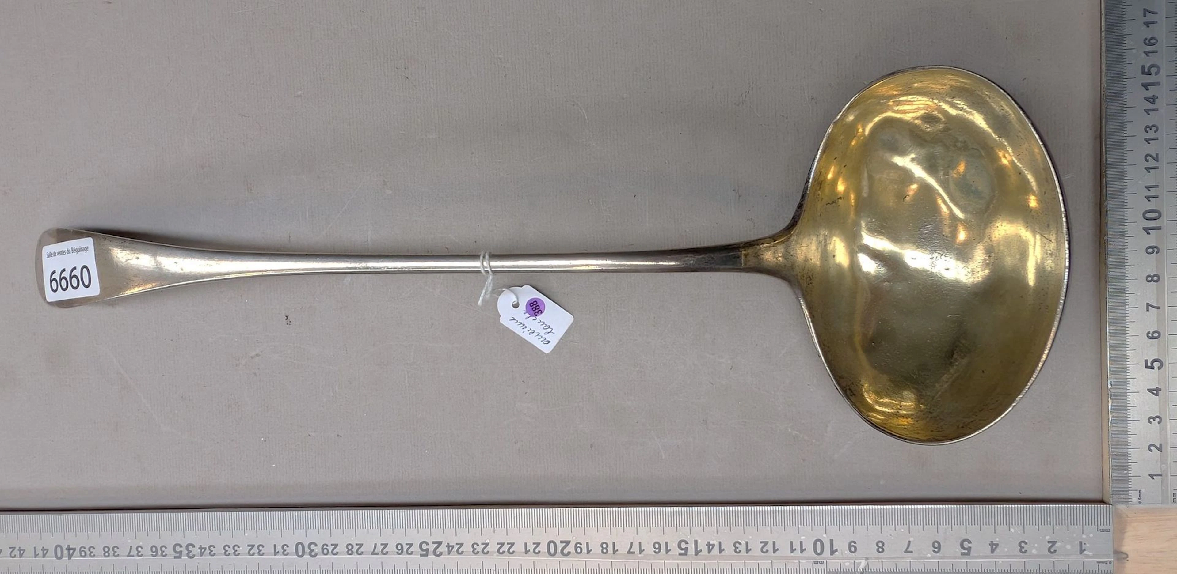 Antique metal-handled ladle—see photos for dimensions and condition