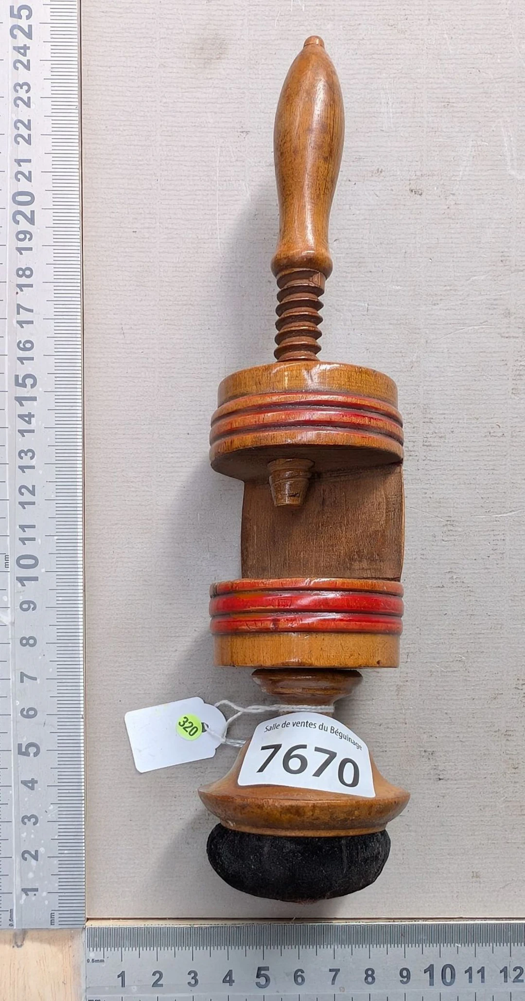 1 antique corkscrew on a wooden base—see photos for dimensions and condition