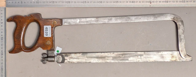 1 antique butcher's saw—see photos for dimensions and condition