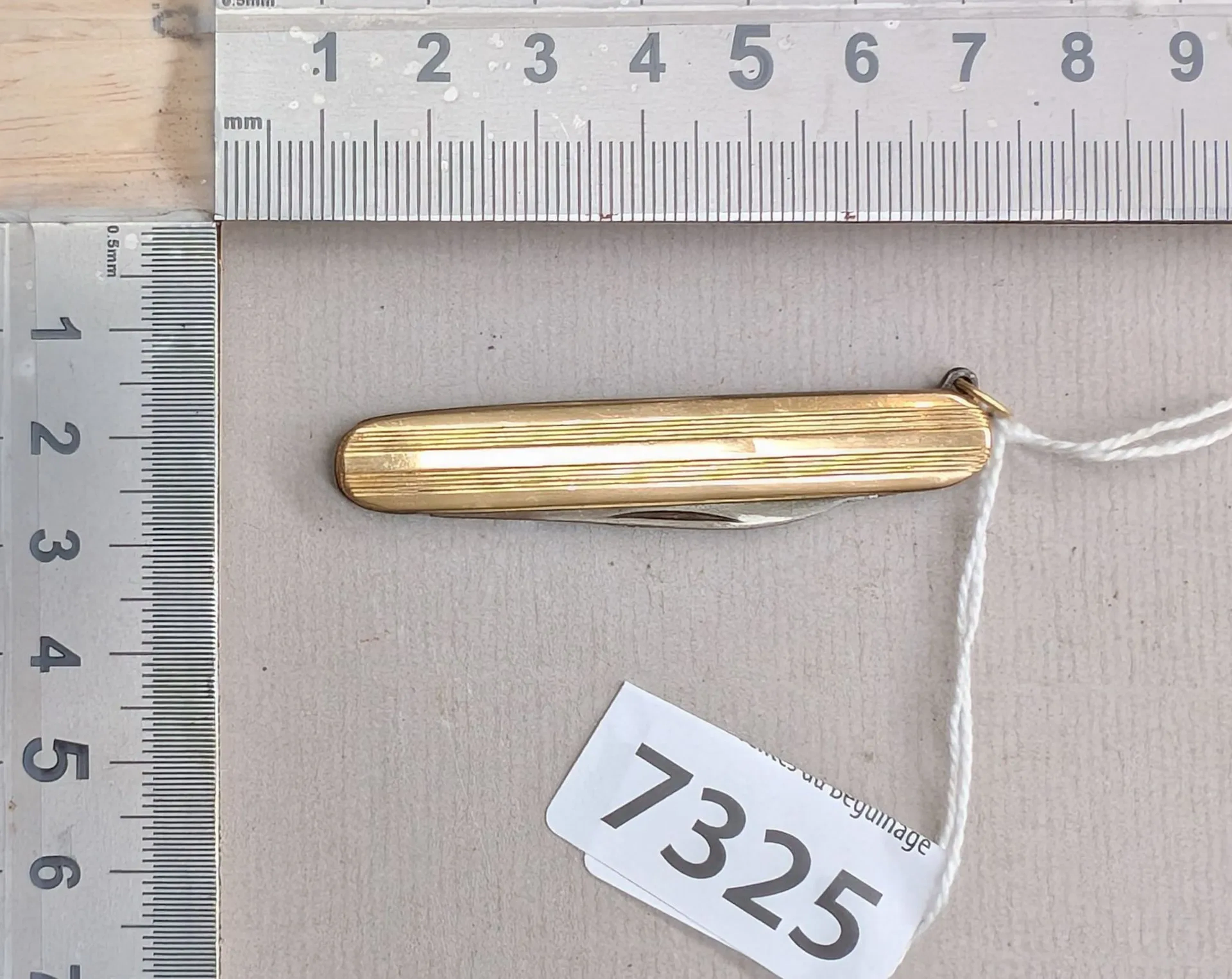 1 antique gold-plated knife - See photos for dimensions and condition