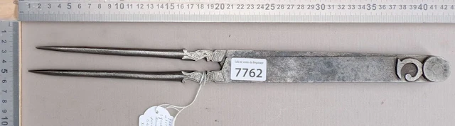Rare 16th-century antique wrought-iron compass with dragon heads and